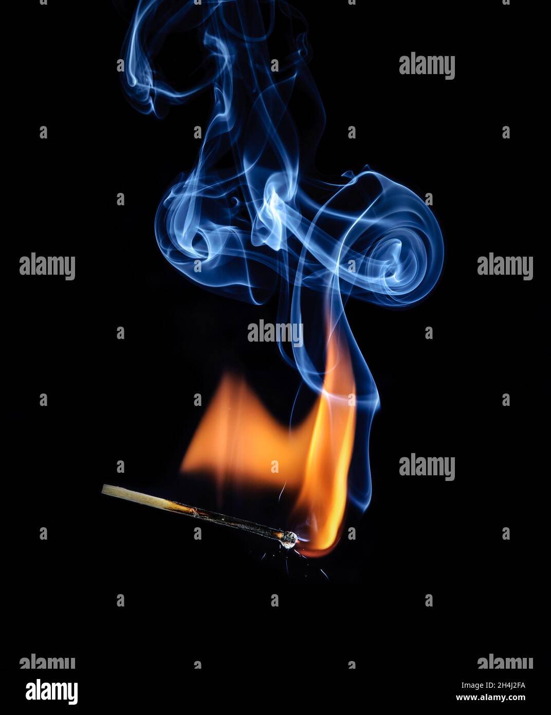 Match burning and smoking Stock Photo Alamy