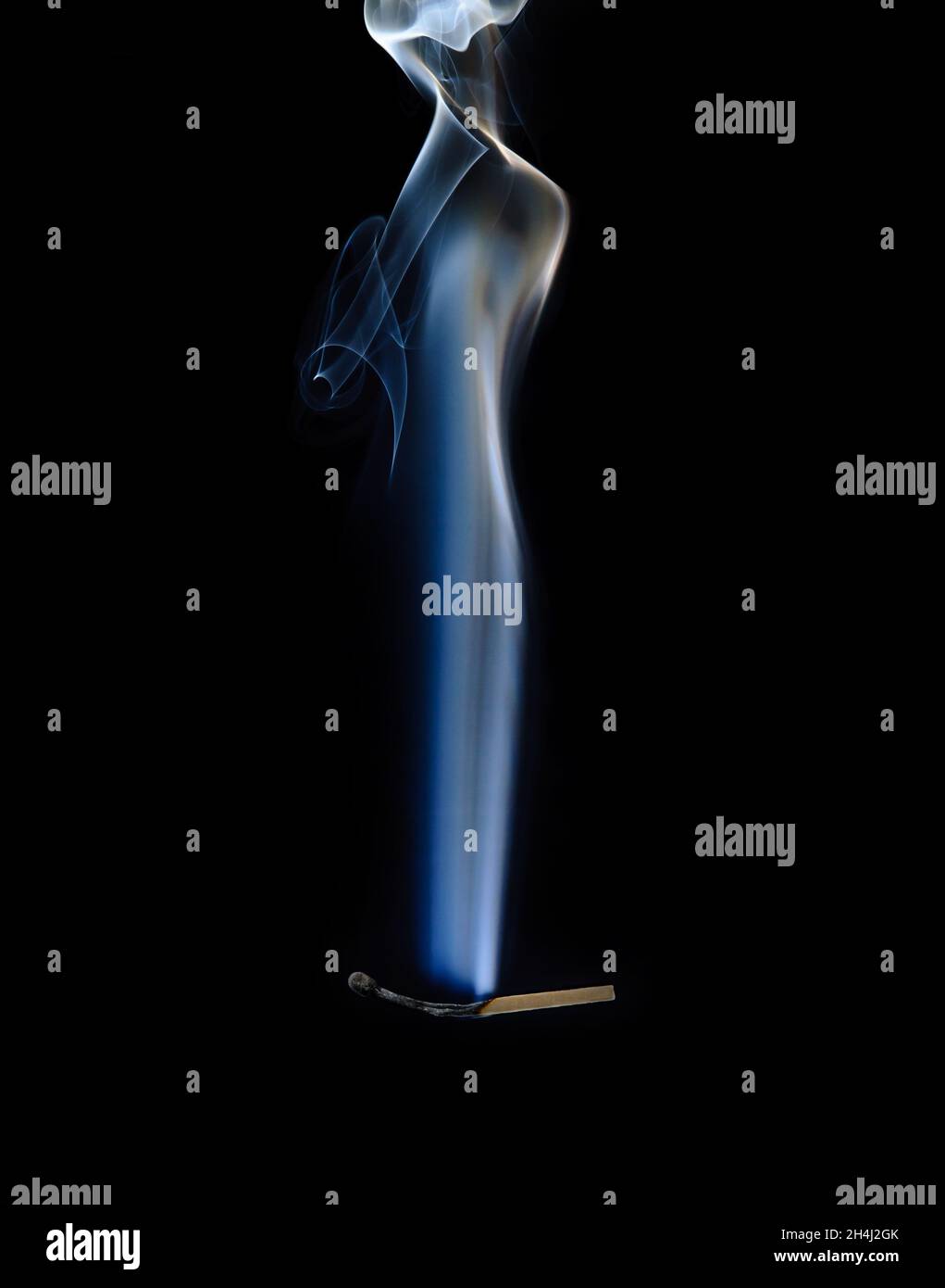 Extinguished and smoking match, Match extinguished and smoking Stock Photo