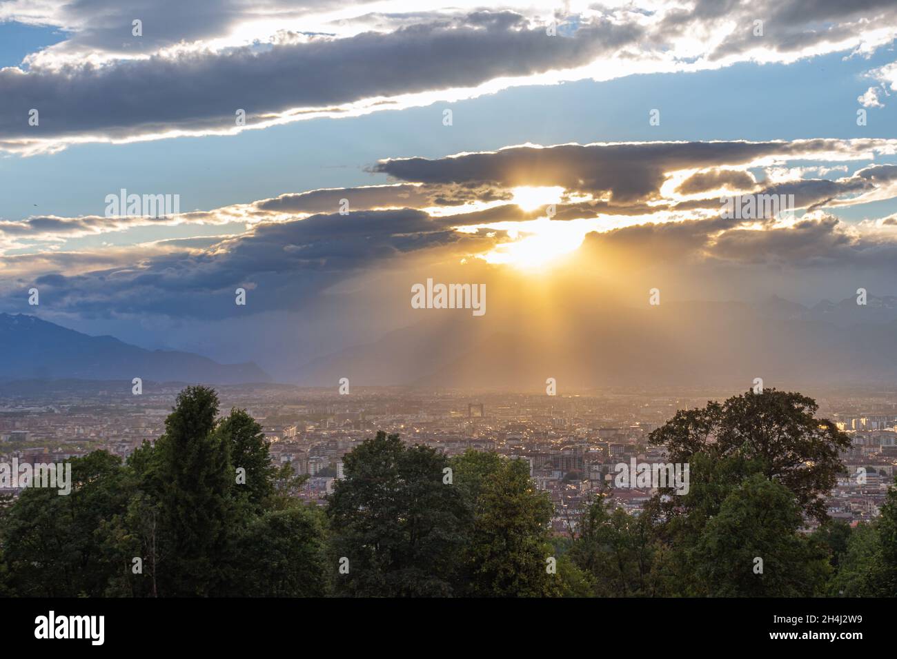 sunset over the mountains, alps. Nature surrounds Turin, Italy Stock Photo