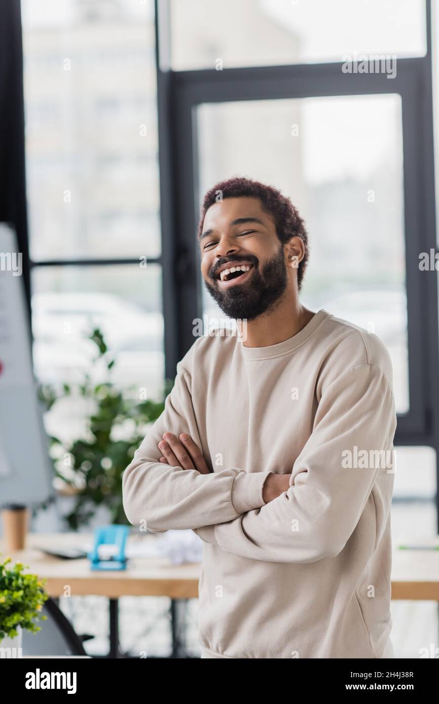 Happy smiling businessman with crossed arms pose hi-res stock ...