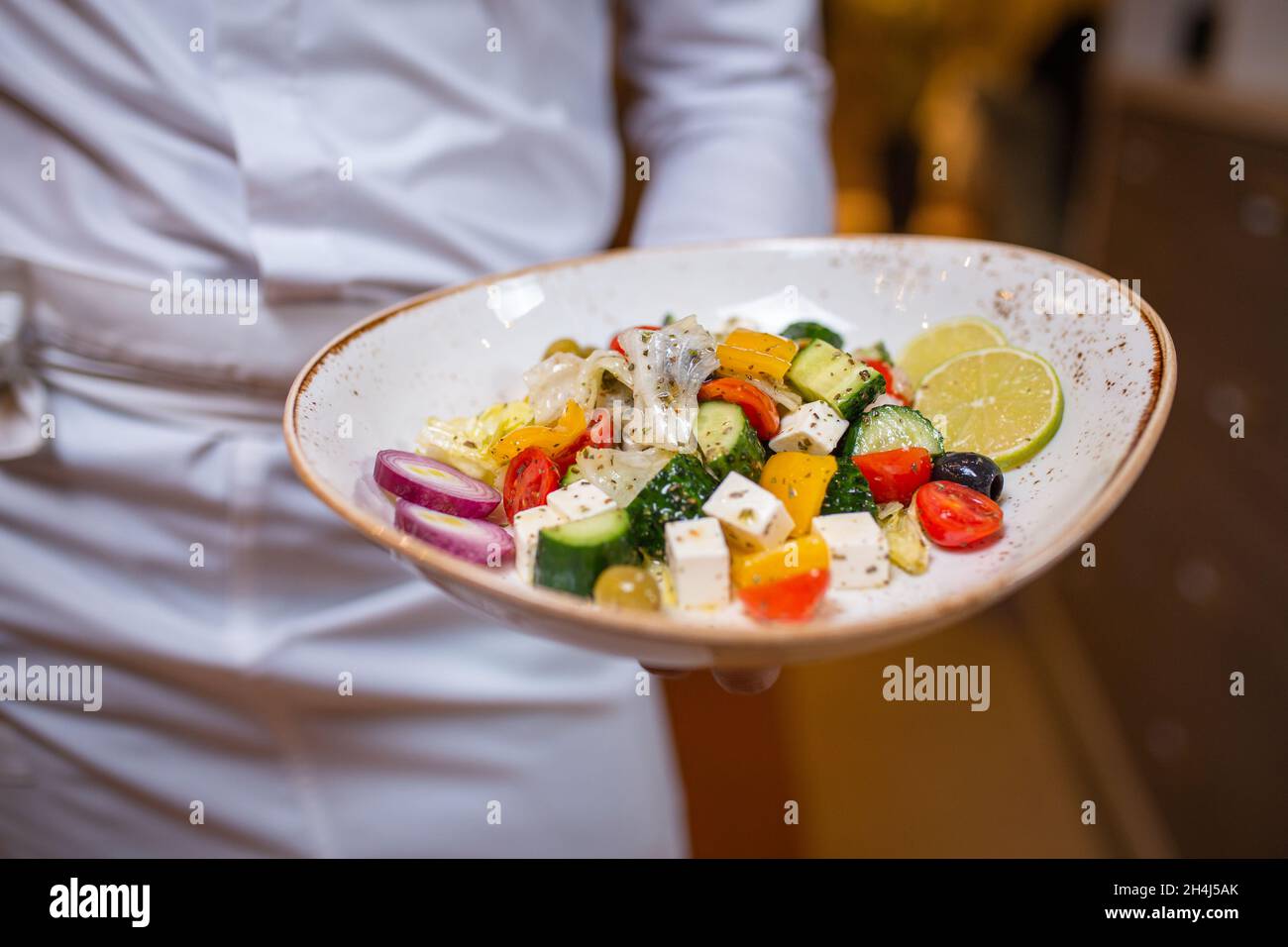 Waiter wearing uniform hi-res stock photography and images - Alamy