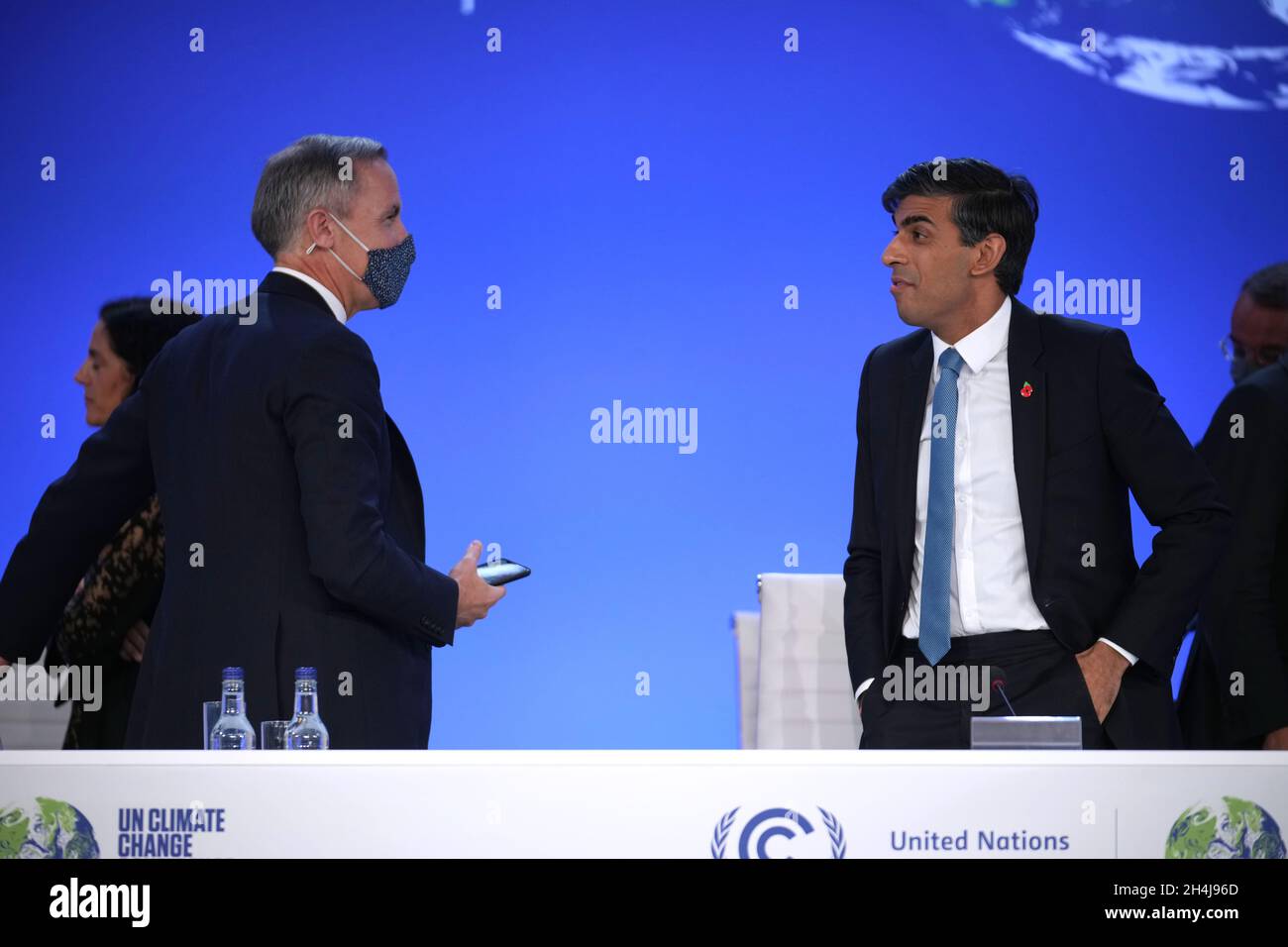 Chancellor Rishi Sunak (right) and Mark Carney, Prime Minister Boris Johnson's Finance Adviser for COP26, ahead of an event on transforming the global financial sector to deliver climate goals, during the Cop26 summit at the Scottish Event Campus (SEC) in Glasgow. Picture date: Wednesday November 3, 2021. Stock Photo