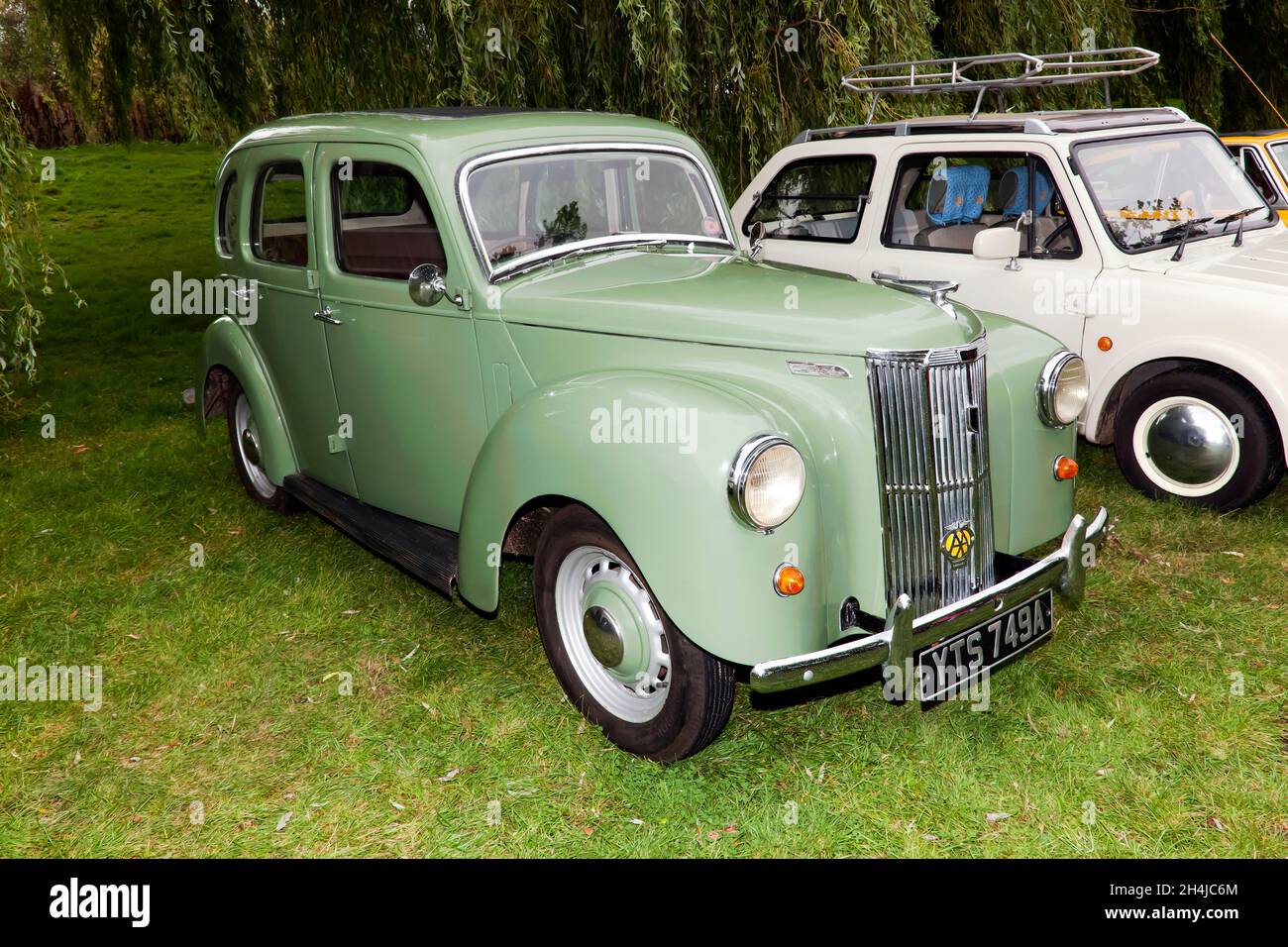 Three-quarter Front View of a  Green, 1953,  Ford Prefect, on display at the Sandwich Festival Classic Car Show 2021 Stock Photo