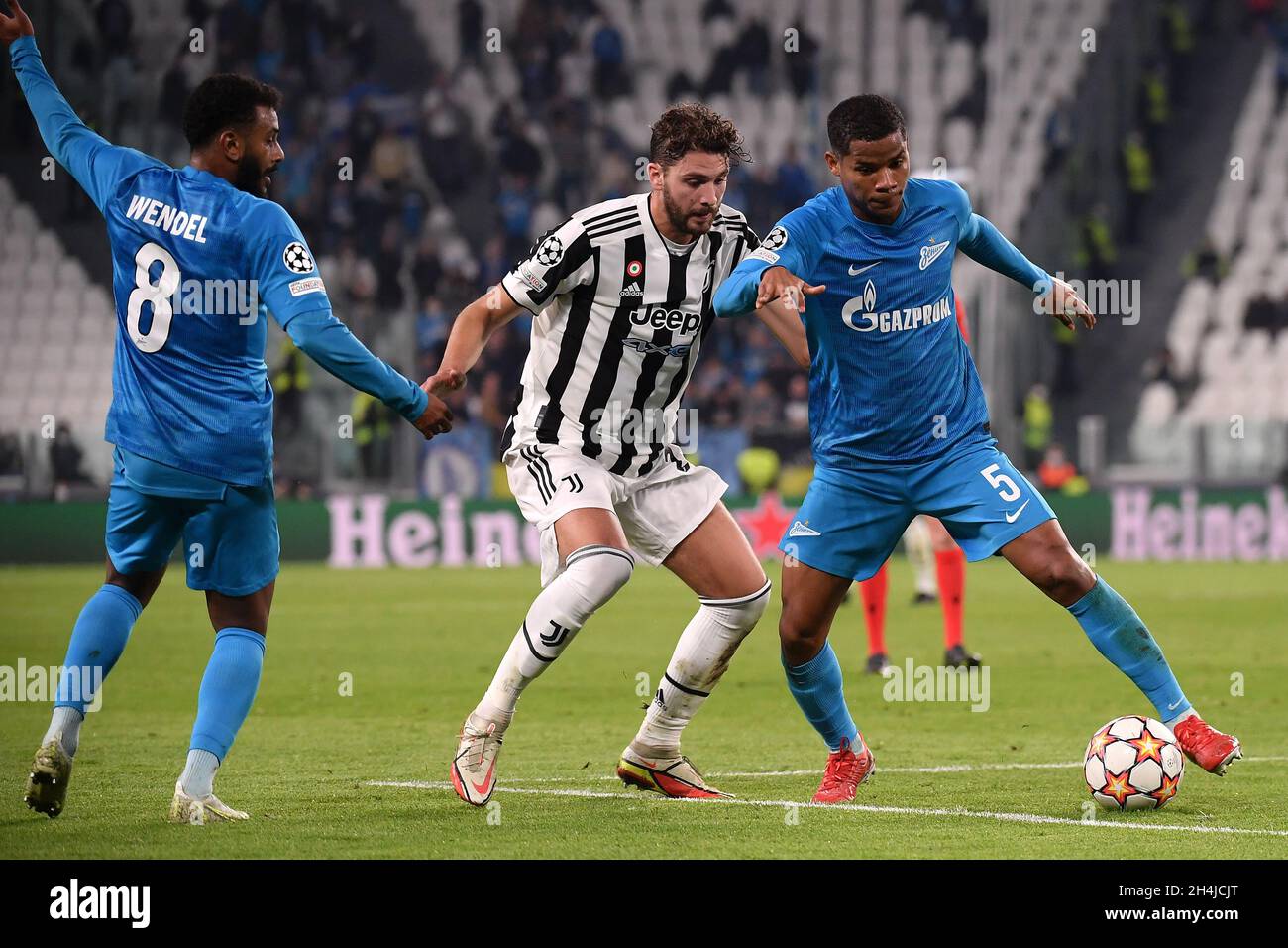Torino, Italy. 02nd Nov, 2021. Wendel of Zenit, Manuel Locatelli of Juventus FC and Wílmar Barrios of Zenit compete for the ball during the Uefa Champions League group H football match between Juventus FC and Zenit ST Petersburg at Juventus stadium in Torino (Italy), November 2nd, 2021. Photo Federico Tardito/Insidefoto Credit: insidefoto srl/Alamy Live News Stock Photo