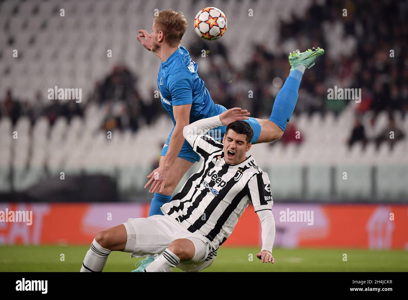 Dmitri Chistyakov of Zenit and Alvaro Morata of Juventus FC compete for the ball during the Uefa Champions League group H football match between Juventus FC and Zenit ST Petersburg at Juventus stadium in Torino (Italy), November 2nd, 2021. Photo Federico Tardito / Insidefoto Stock Photo