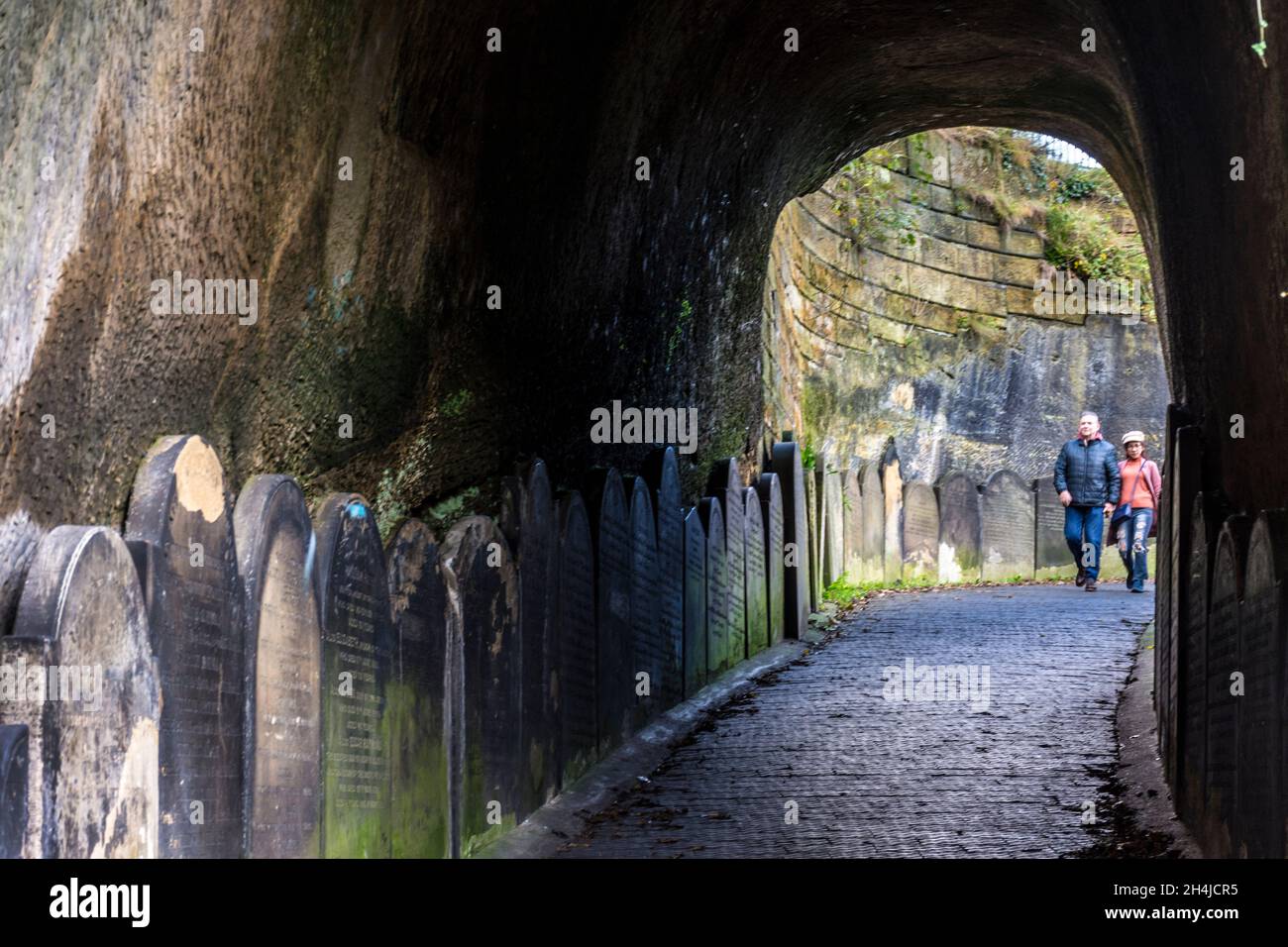 Gravestones at entrance tunnel to  St James’s Cemetery, Liverpool. UK.This fine graveyard in the city centre is best started with a quick walk through Stock Photo