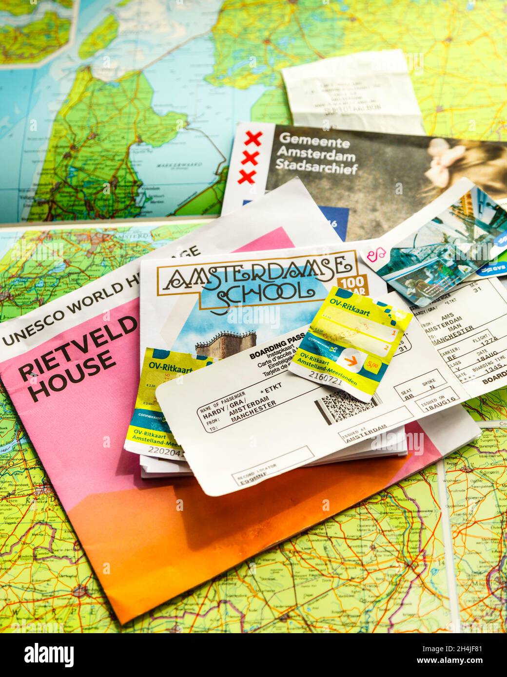 A collection of travel documents, maps and information about Amsterdam Stock Photo