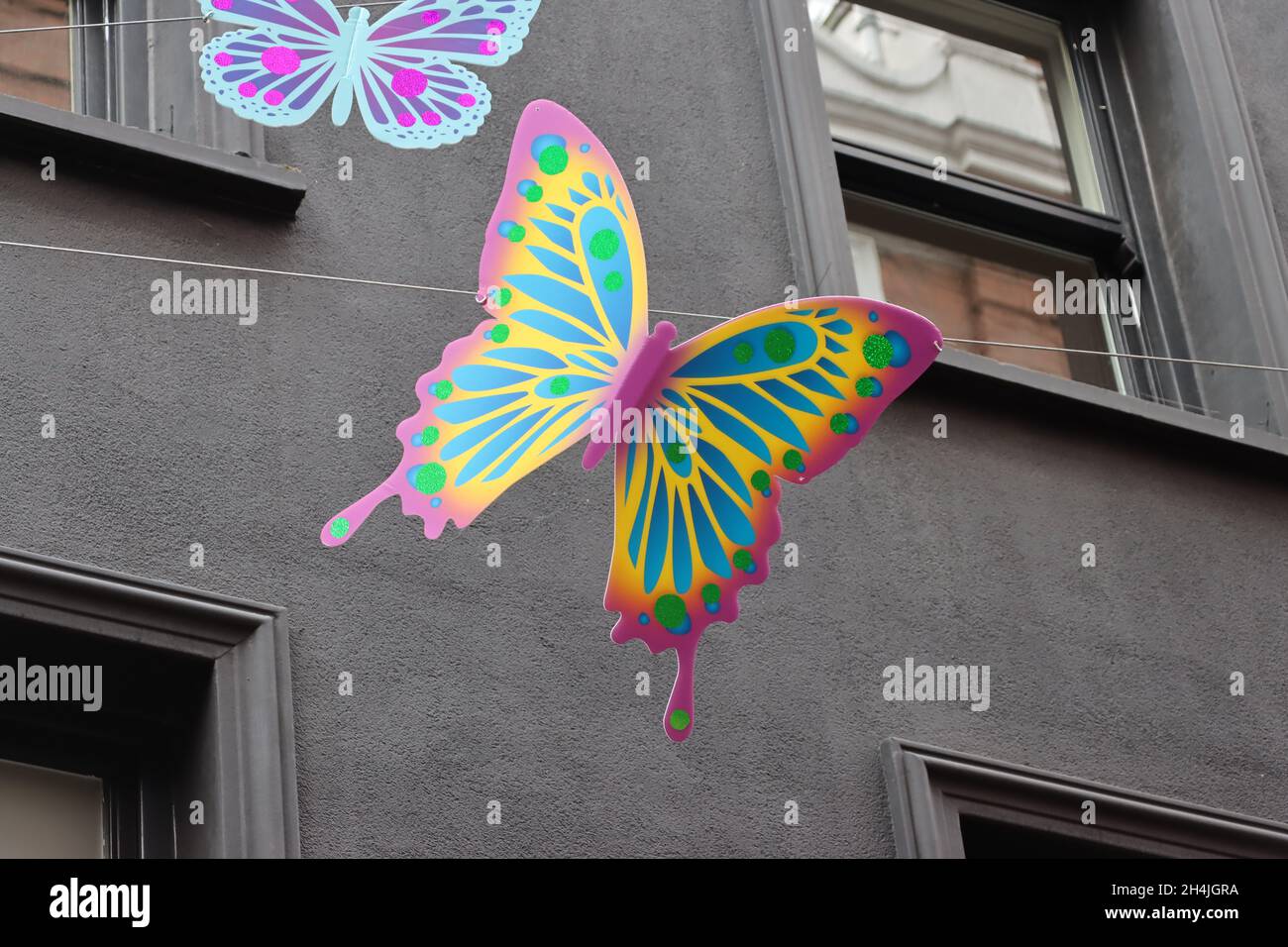 Carnaby Street decorations. The iconic street celebrates the many colours of London. Stock Photo