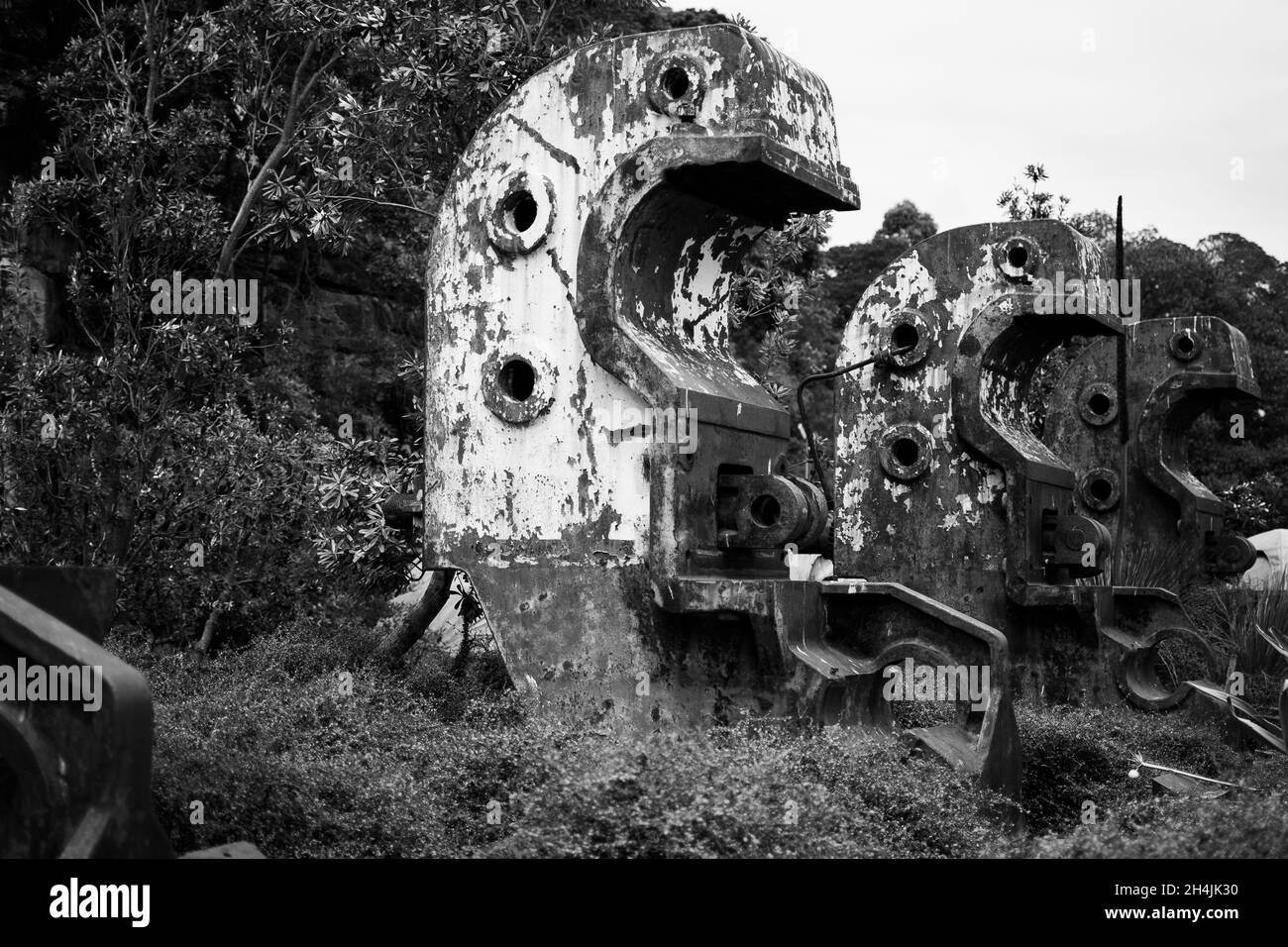 Grayscale shot of the old rusty industrial equipment. Stock Photo