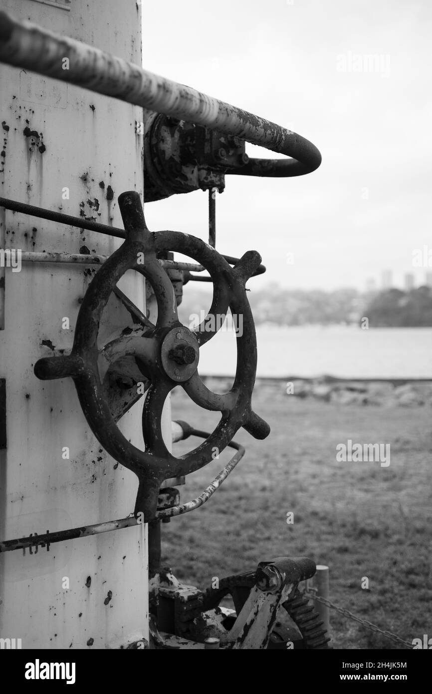 Vertical grayscale closeup of the industrial equipment. Stock Photo