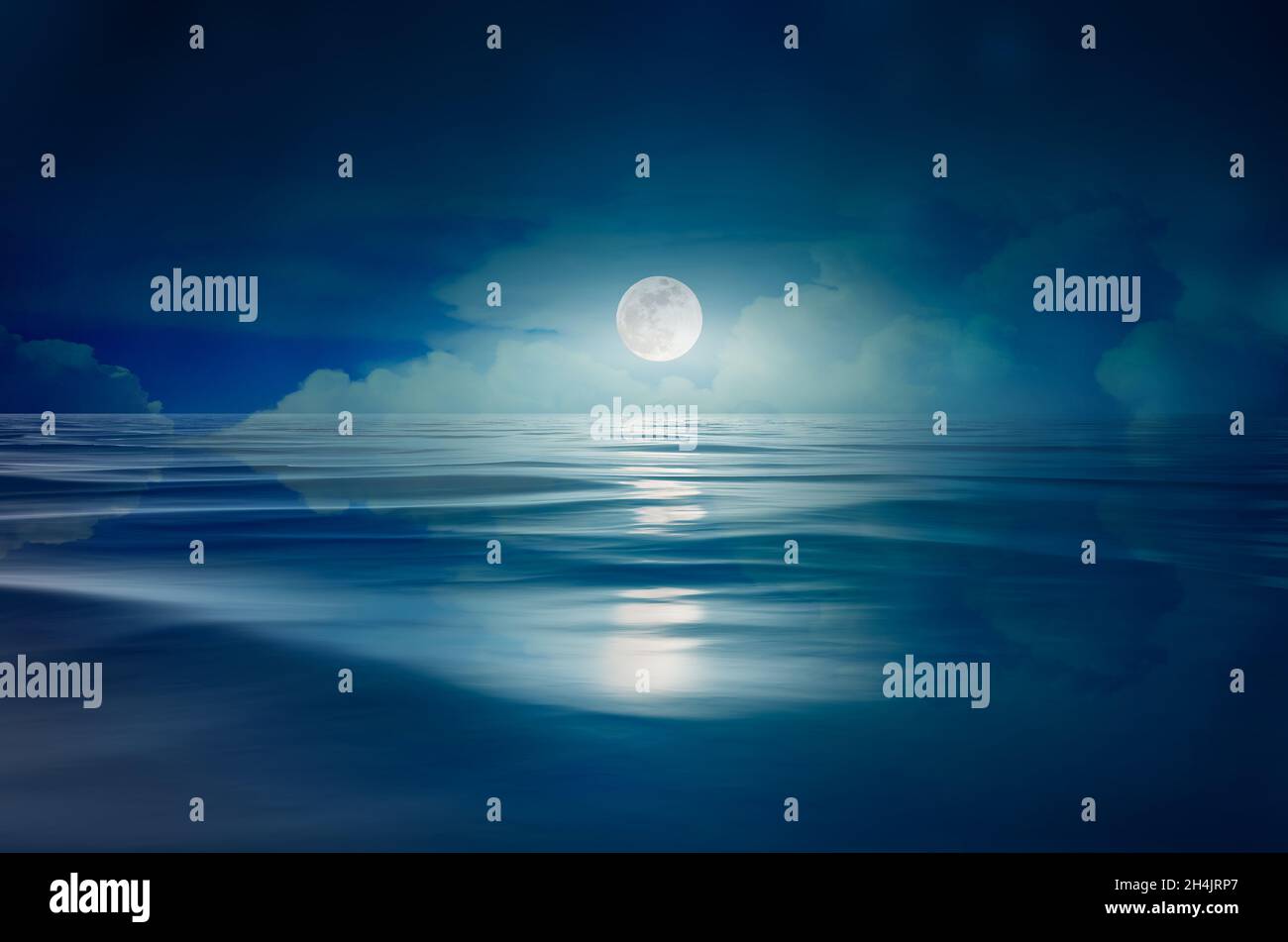 full moon in the sea at night Stock Photo