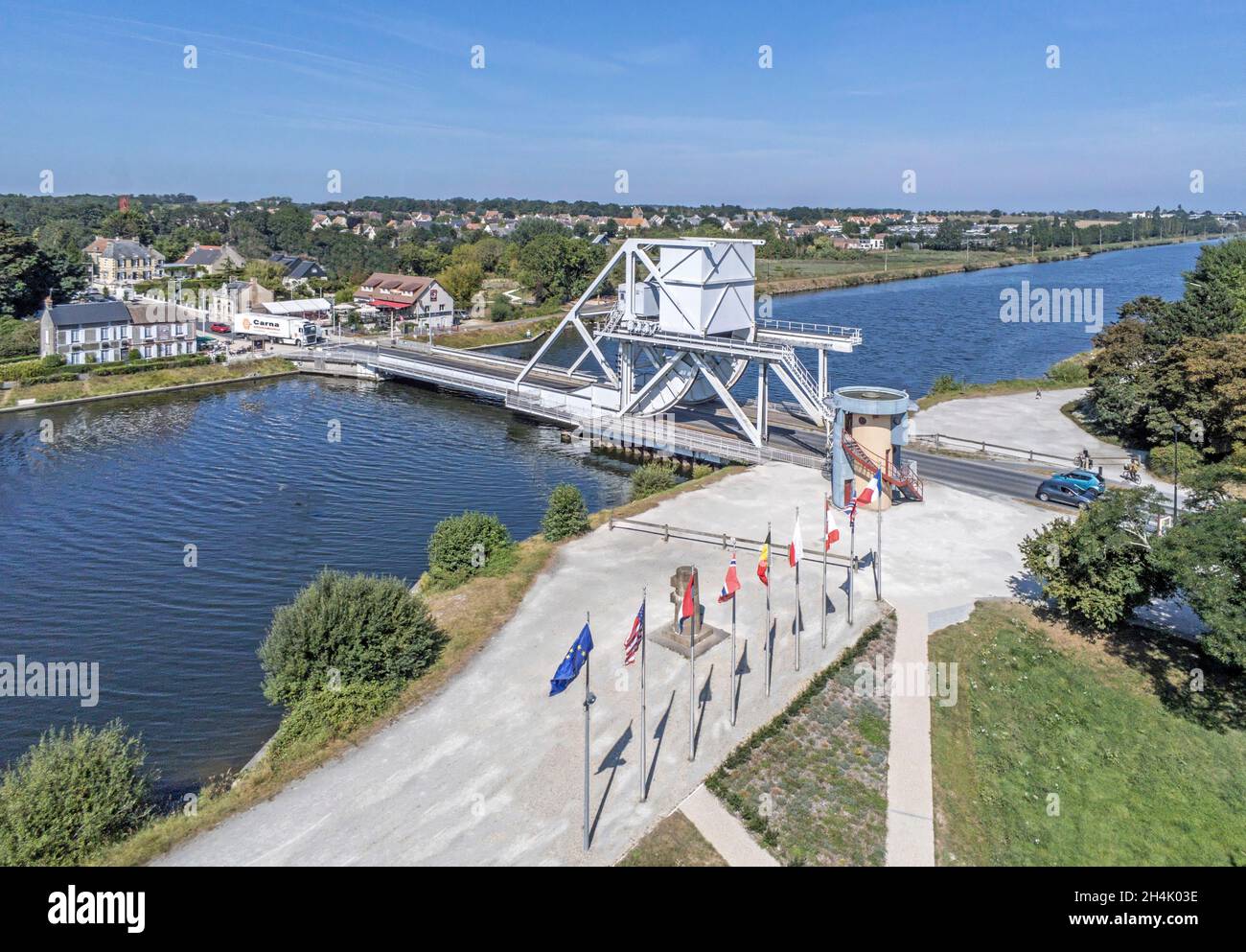France, Calvados, Benouville bridge or Pegasus Bridge, drawbridge crossing canal de Caen to the sea, released on June 6, 1944 by a British commando arrived from airspeed horsa gliders at night (aerial view) Stock Photo