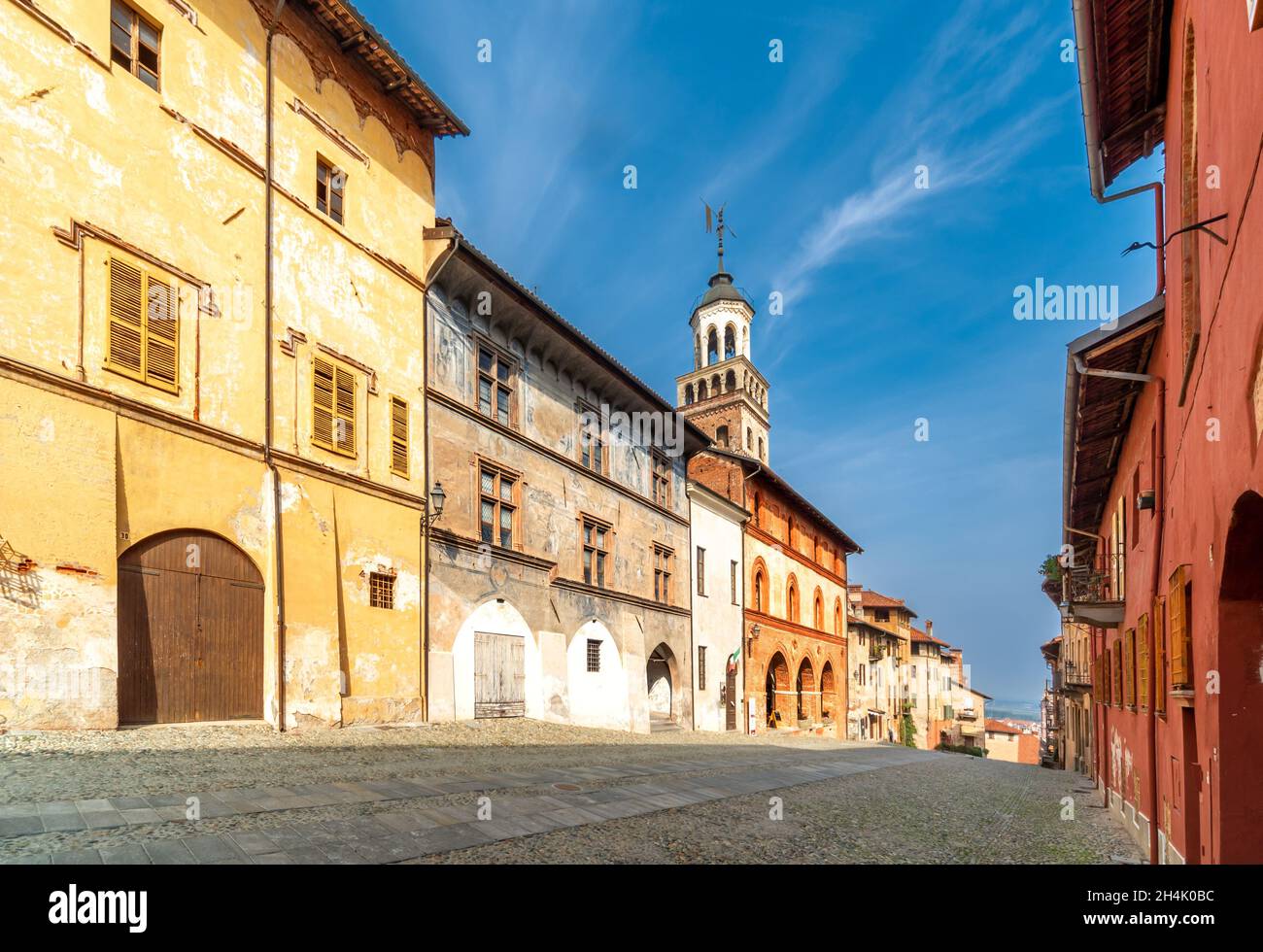 Saluzzo, Cuneo, Italy - October 19, 2021:  Salita al Castello street with on the left Palazzo delle Arti liberali and the ancient town hall Stock Photo