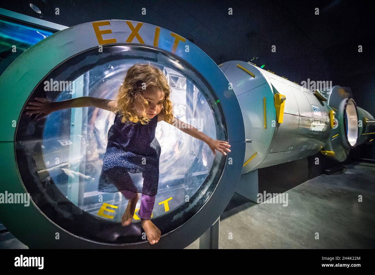 United States, Florida, Orlando, Cape Canaveral, Kennedy Space Center, space museum, child emerging from a space station replica Stock Photo