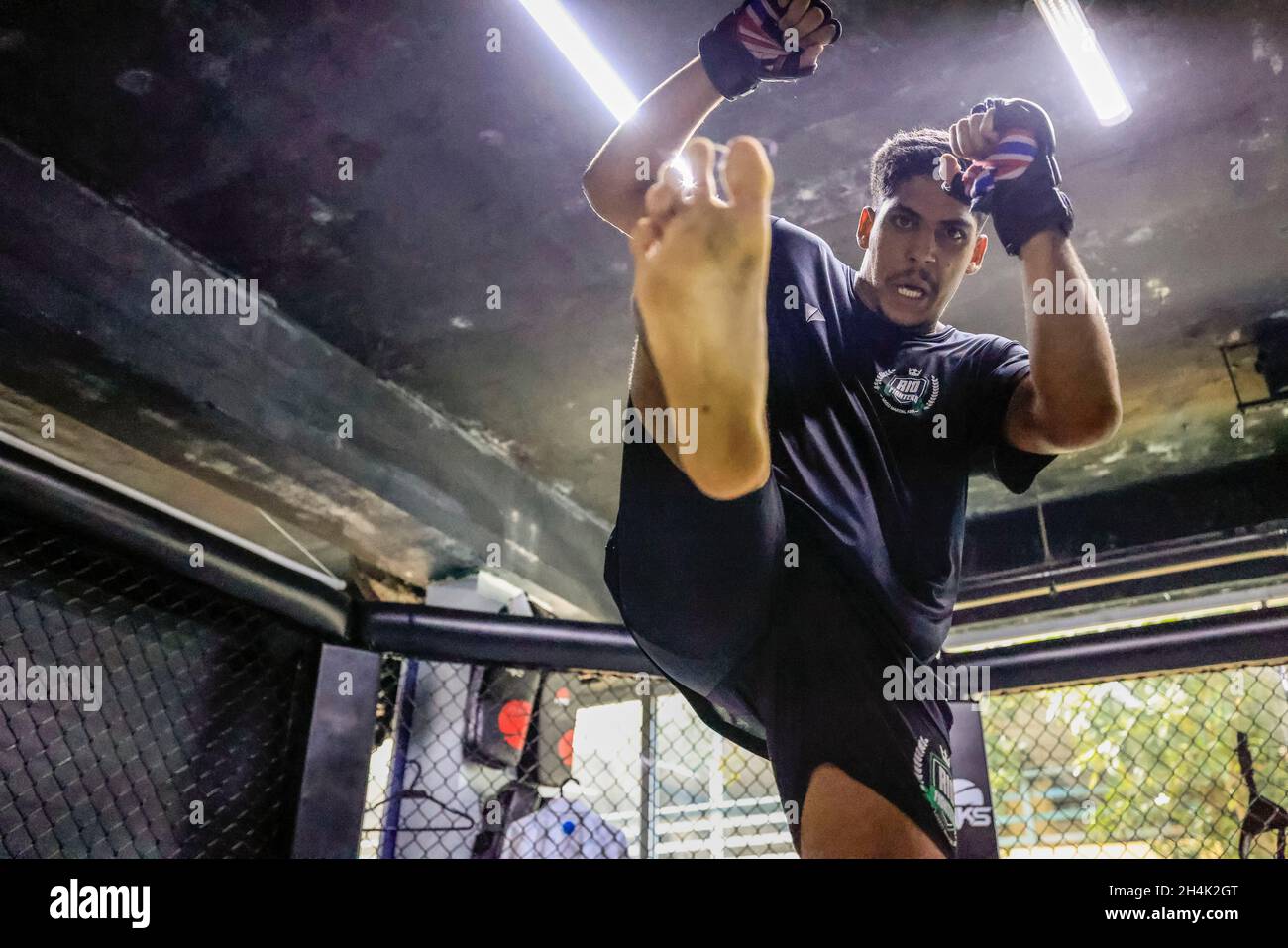 Brazil, Rio de Janeiro, Julio in training in the Rio Fighters club, MMA is  the only combat sport that allows shots on the ground, long banned in France,  MMA was legalized very