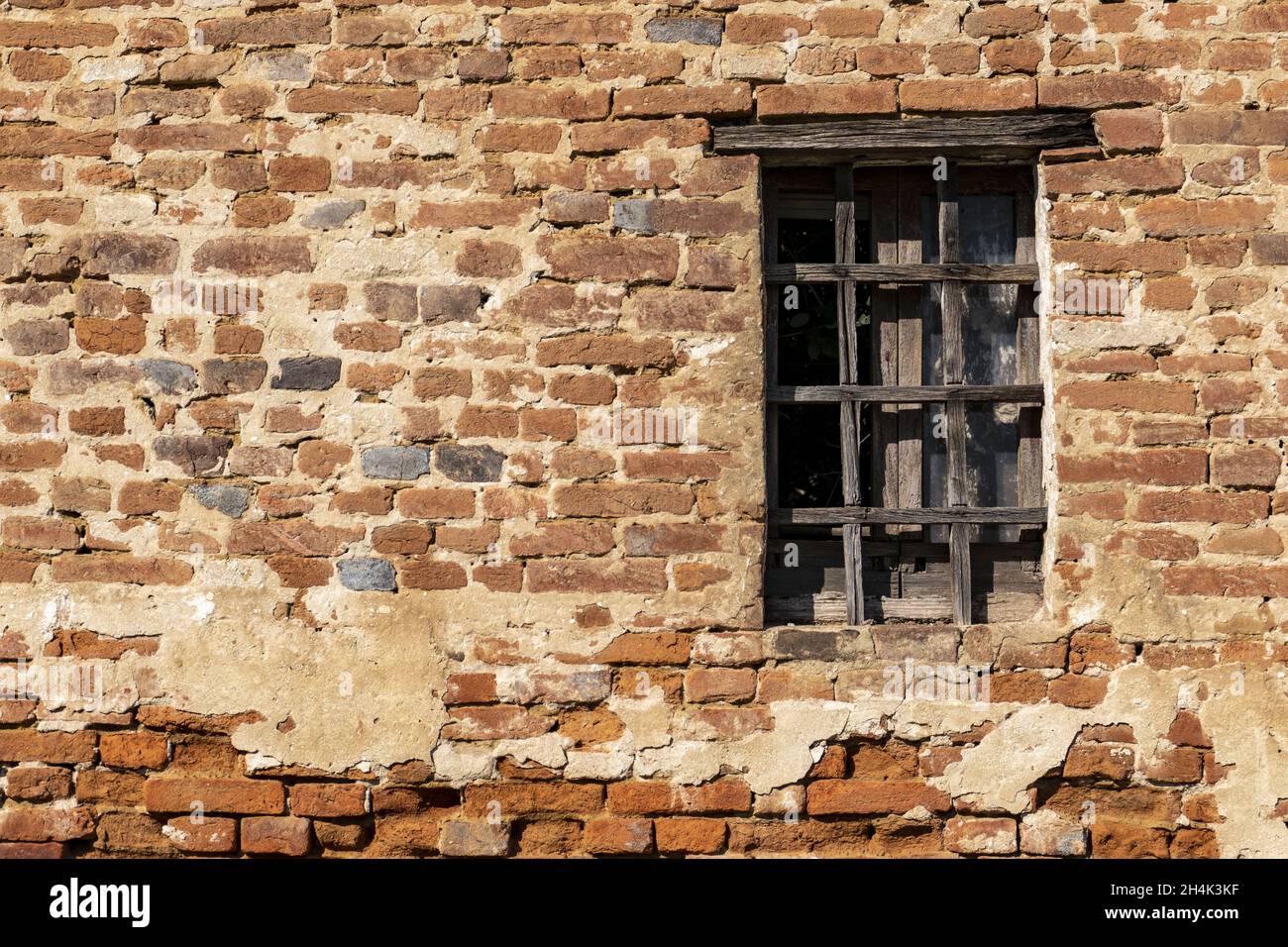 Old brick wall and window of a house from outside Stock Photo - Alamy