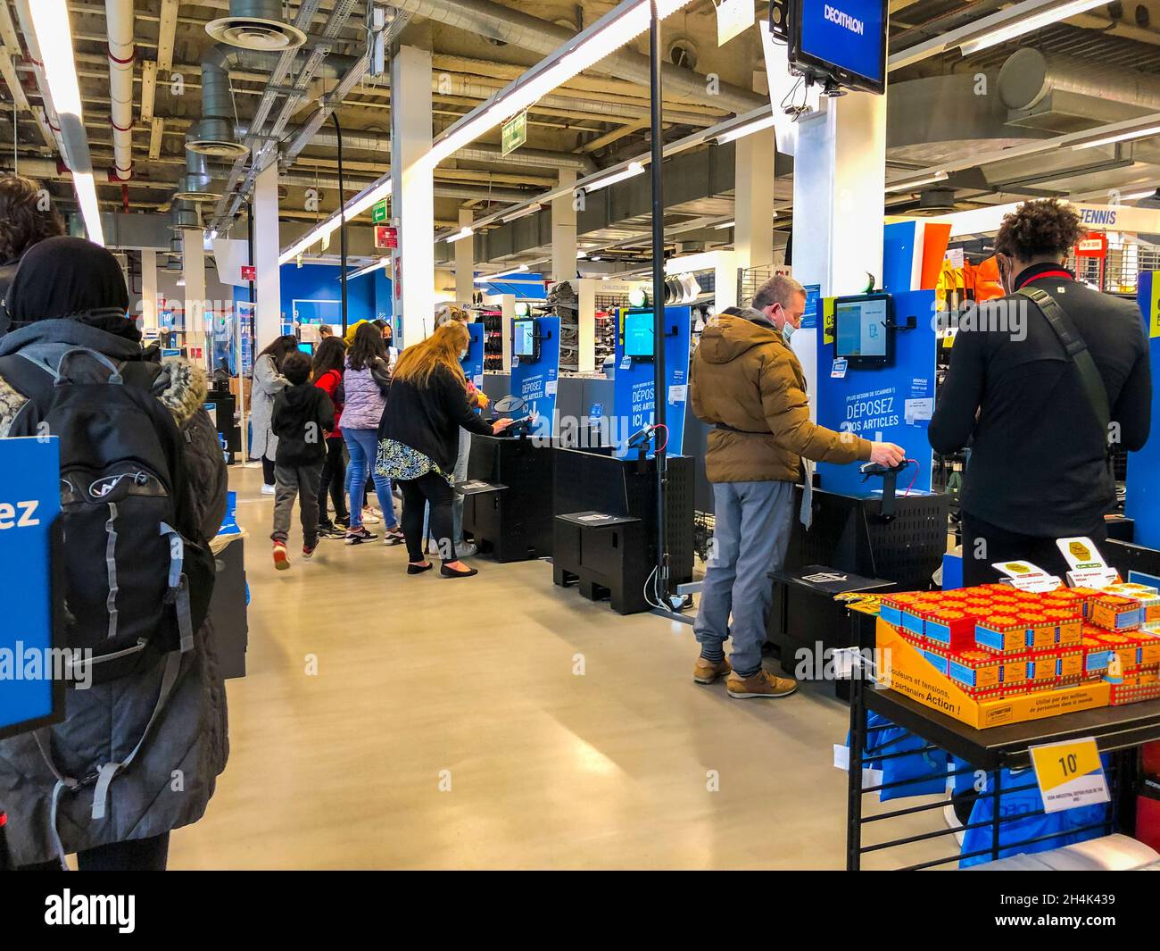 Paris, France, People Shopping in Sports Store, inside using automatic self checkout machines Decathlon Rive Gauche Stock Photo