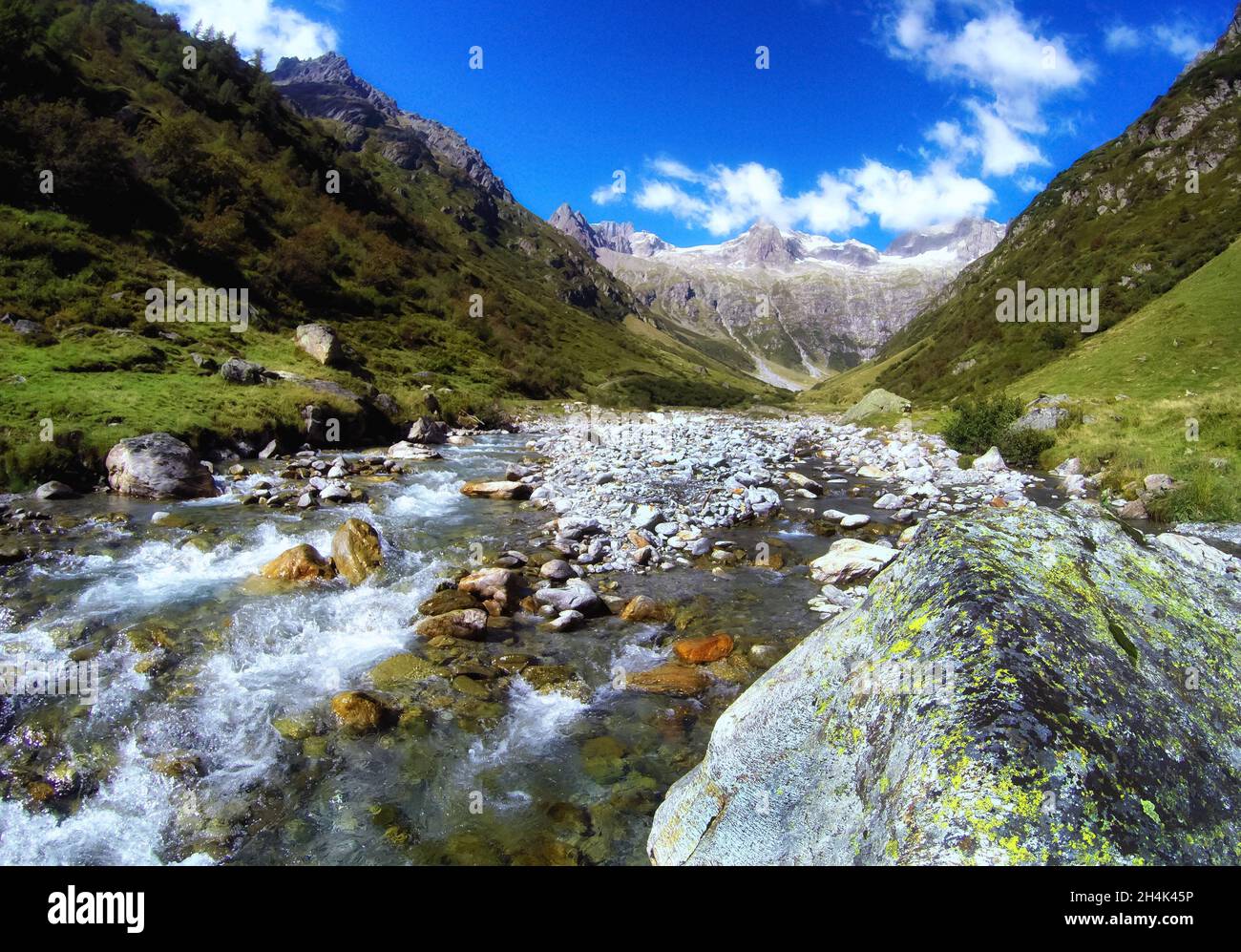 Alpine river in a mountain valley, Gorezmettlen, Wassen, Switzerland Stock Photo