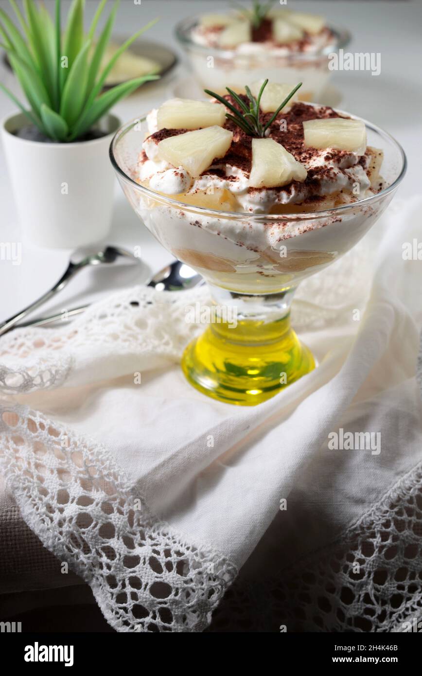 Tiramisu, Italian dessert. Homemade pineapple tiramisu in glasses on ...