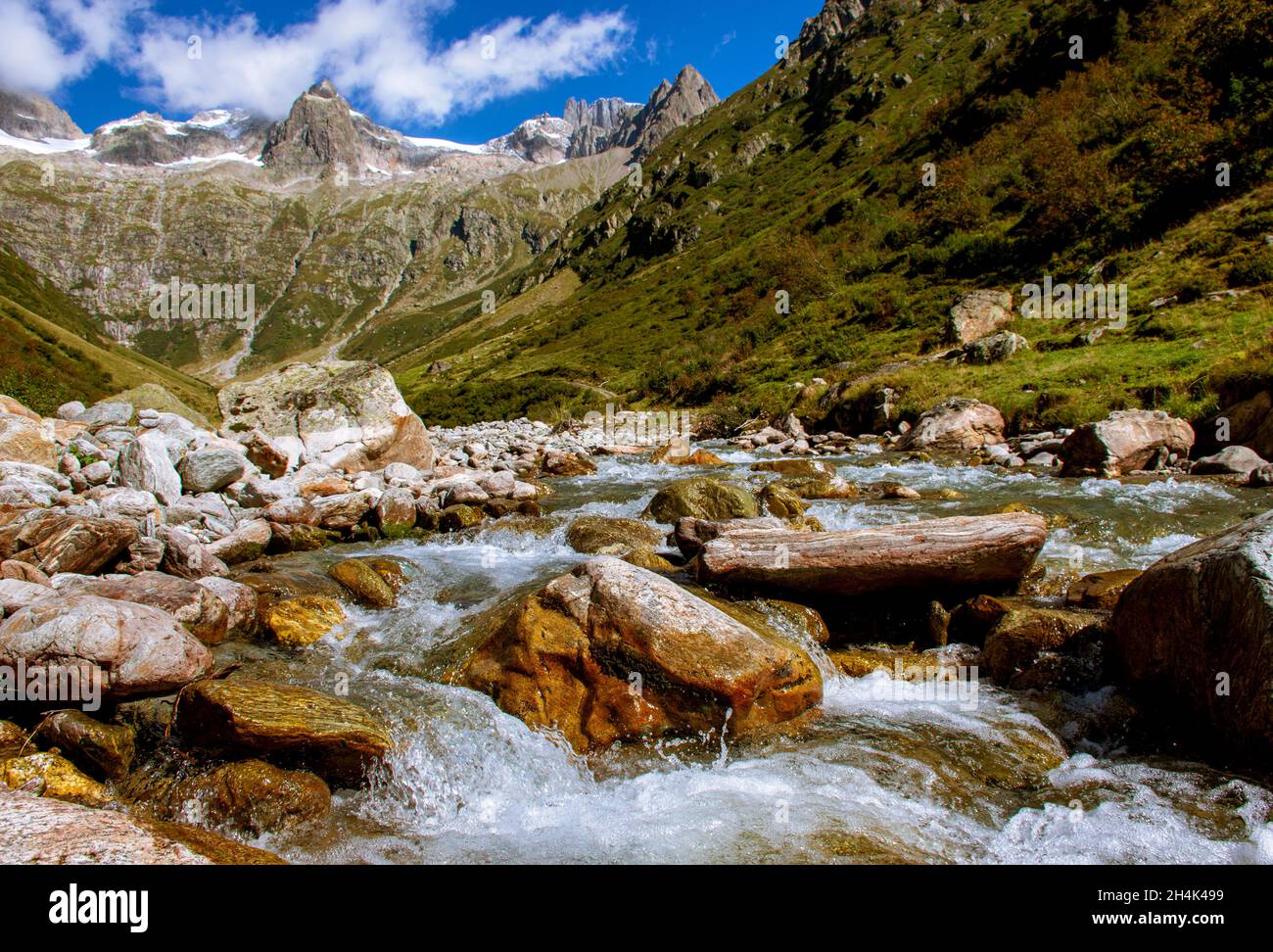 Rapids flowing through mountain valley in autumn, Gorezmettlen, Wassen, Switzerland Stock Photo