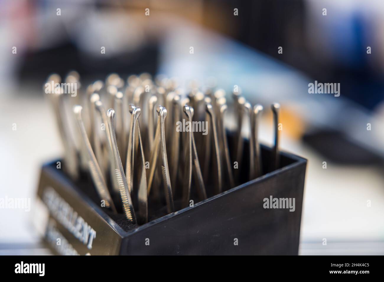 Hair puller tools on a display rack for sale Stock Photo Alamy