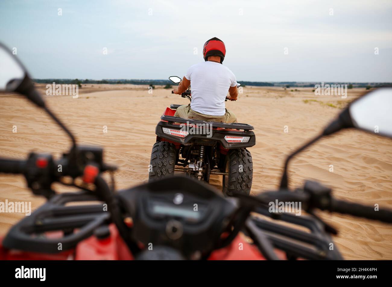 Freedom atv riding in desert, racer eyes view Stock Photo - Alamy