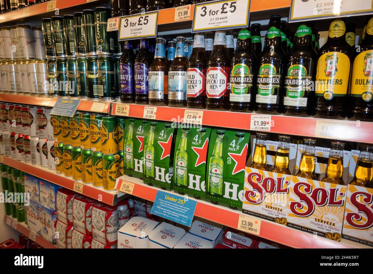 Beer, lager,cider and ale on a shelf in a local supermarket in Norfolk