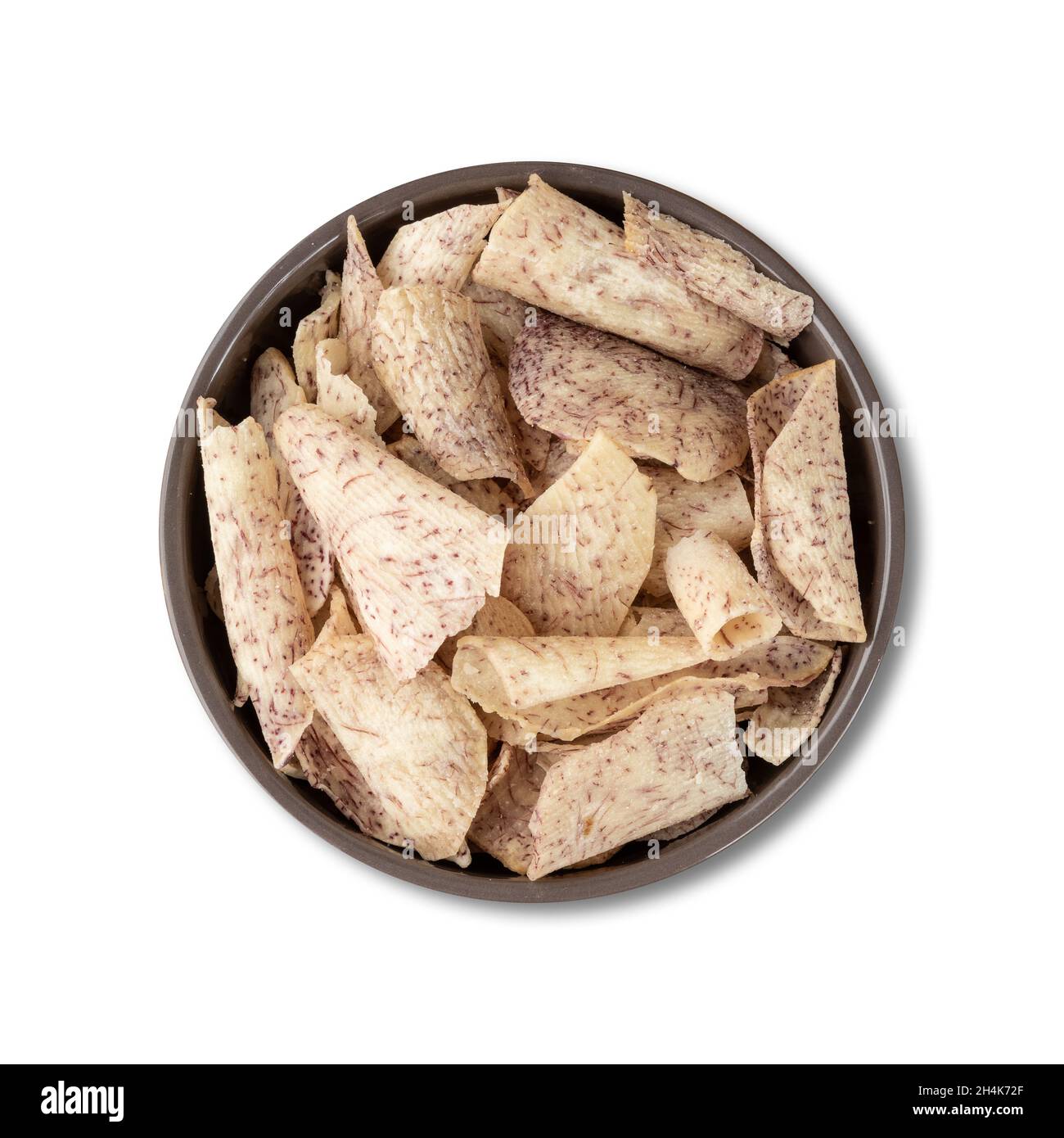 Yam or taro chips in a bowl isolated over white background. Stock Photo