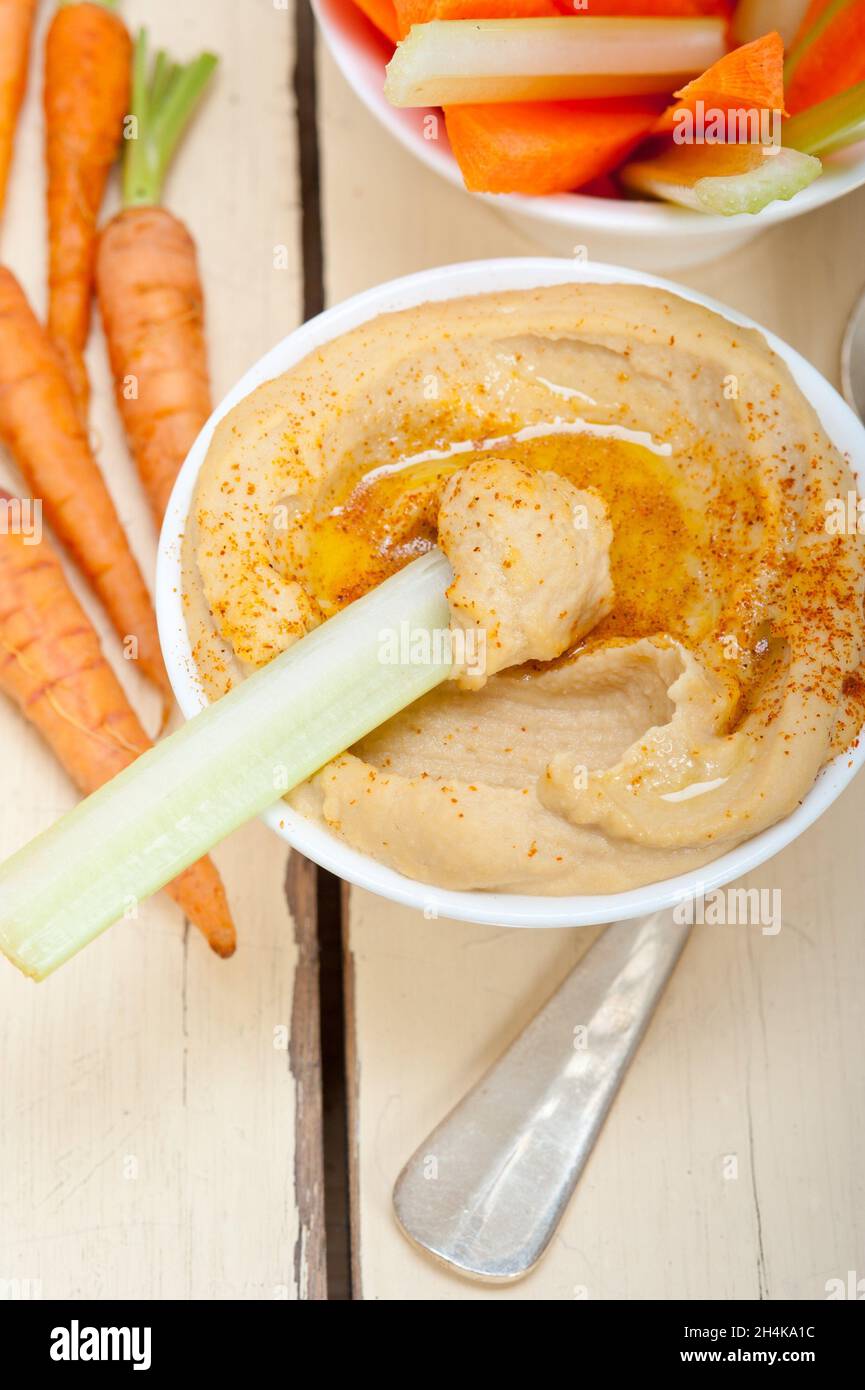 fresh hummus dip with raw carrot and celery arab middle eastent healthy food Stock Photo Alamy