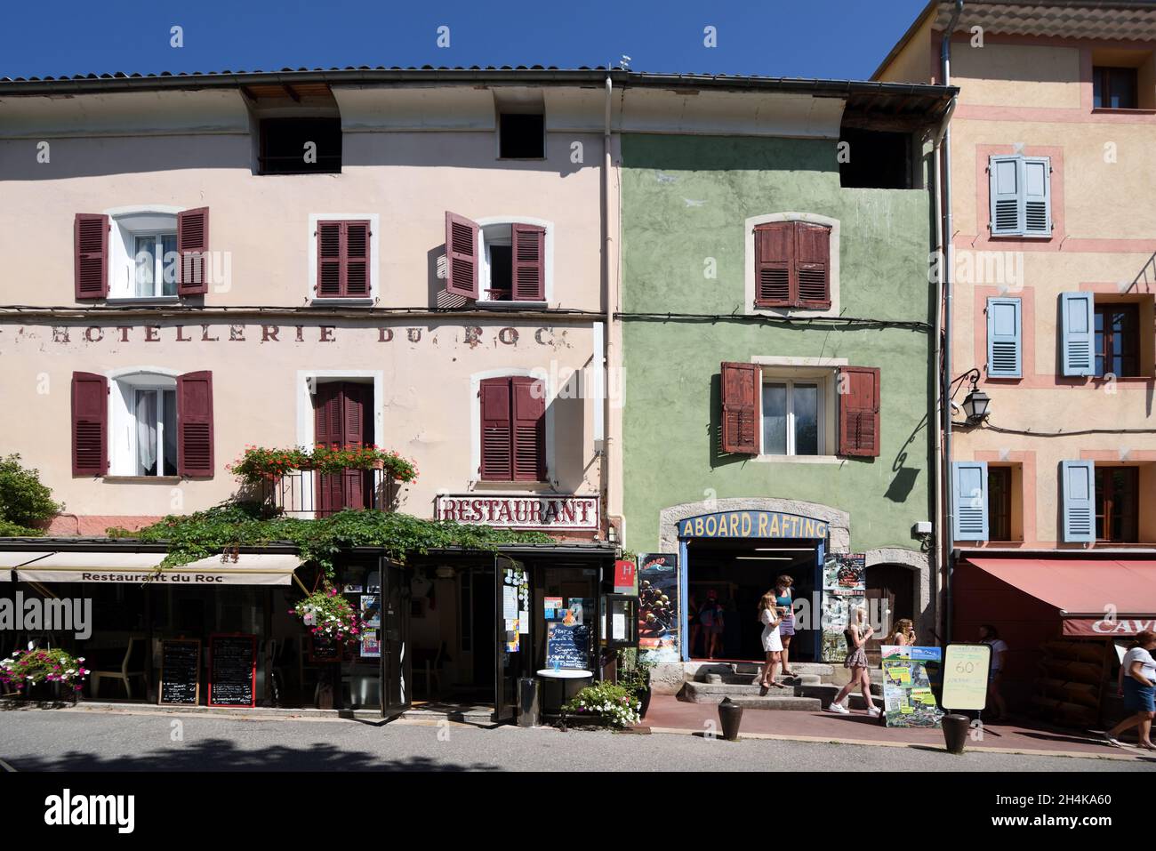 Tourists Outside Hotel Restaurant & Small Shops in the Old Town