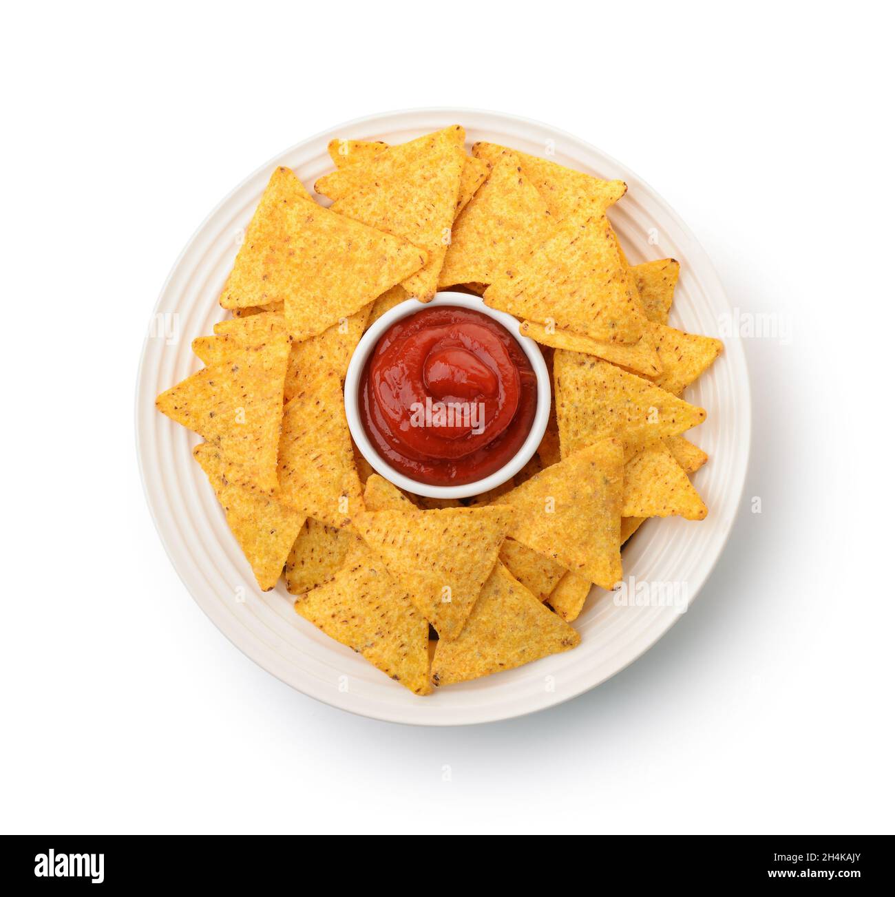 Top view of nacho chips and tomato dip sauce on plate isolated on white
