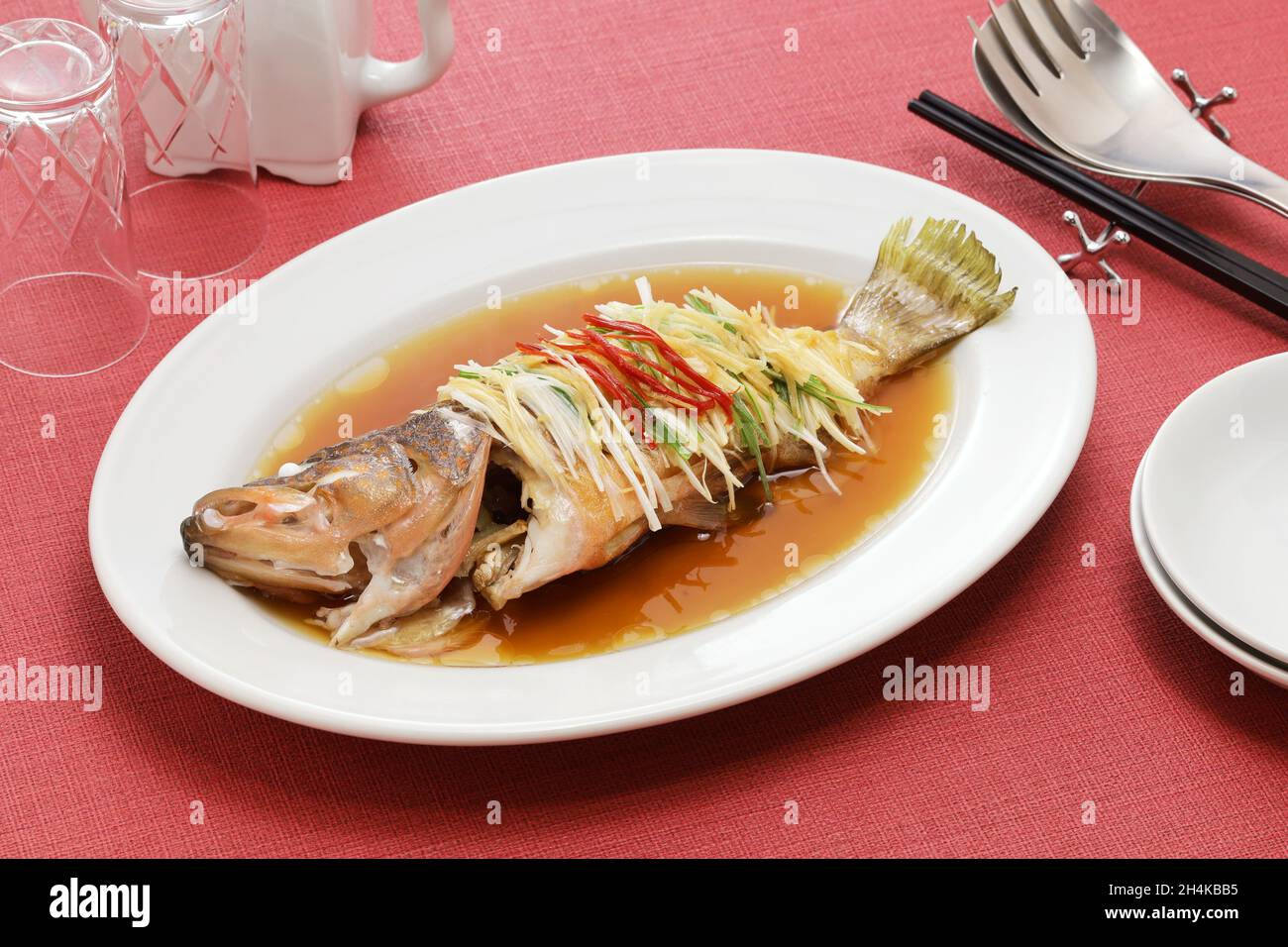 Chinese steamed whole Hong Kong grouper with scallion, ginger, and soy