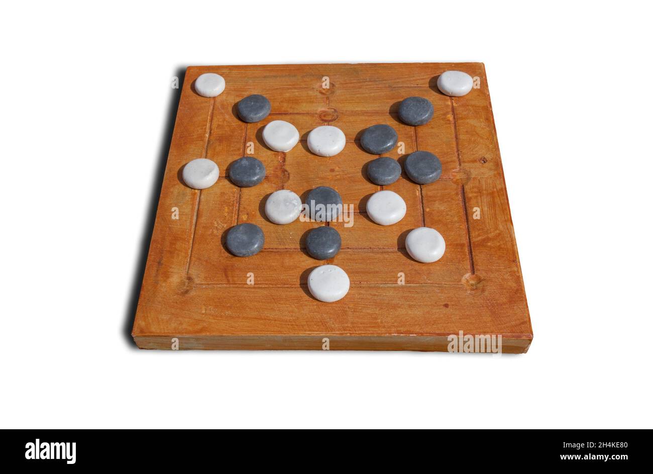 Reconstruction of roman board game Nine mens morris or mill game. Private recreational activity of ancient romans. Stock Photo