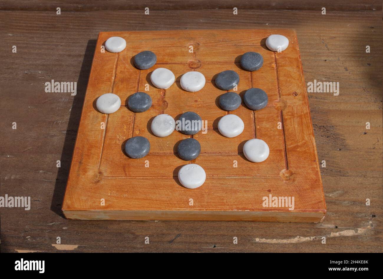 Reconstruction of roman board game Nine mens morris or mill game