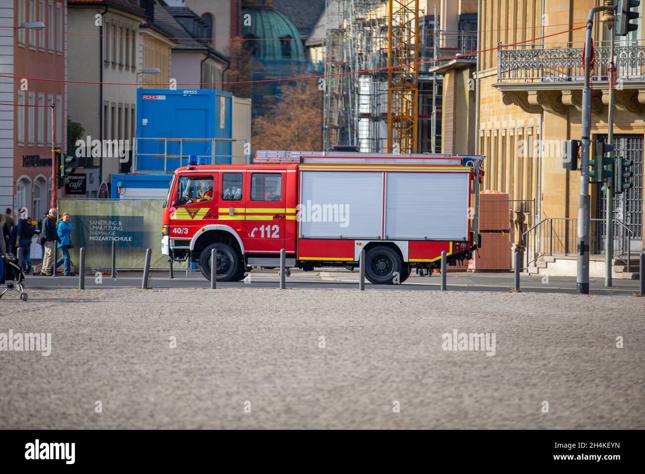 WUERZBURG, GERMANY - OCTOBER 31, 2021: German firetruck drives to an accident in Wuerzburg, Germany. Stock Photo
