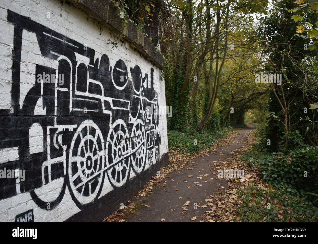 Train mural by Bill Billings beside the Grand Union canal in Wolverton. Stock Photo
