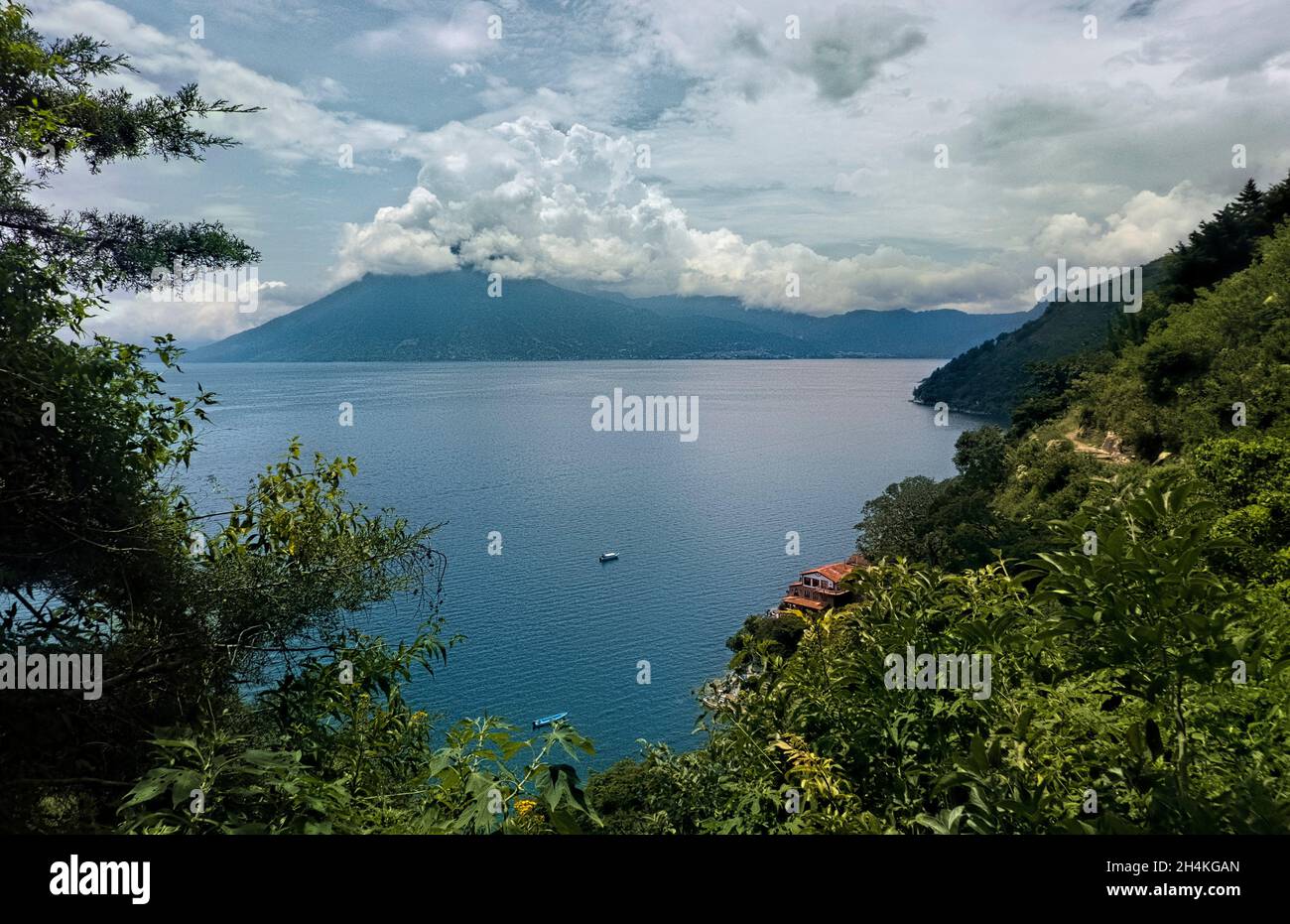 View of San Pedro volcano and Lake Atitlan in the Guatemalan highlands, Solola, Guatemala. Stock Photo