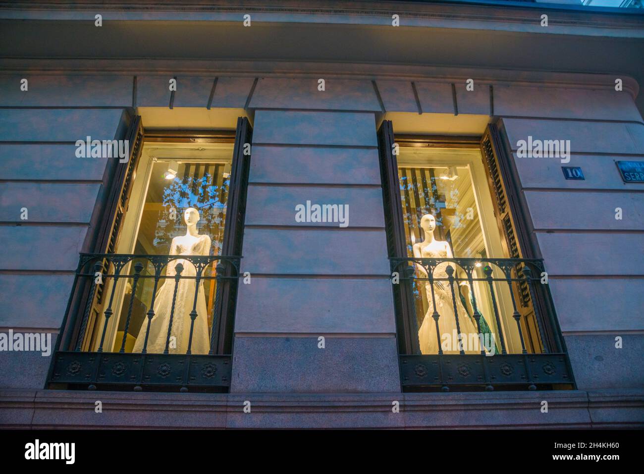 Two mannequins in shop windows. Serrano street, Madrid, Spain Stock