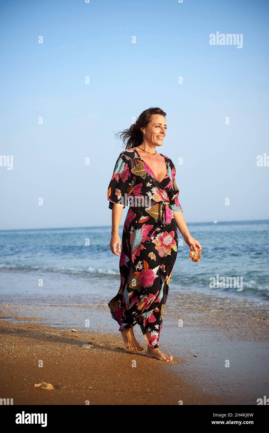 Mature woman happy beach hi-res stock photography and images - Alamy