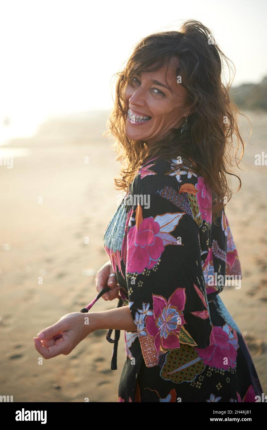 Mature woman happy beach hi-res stock photography and images - Alamy