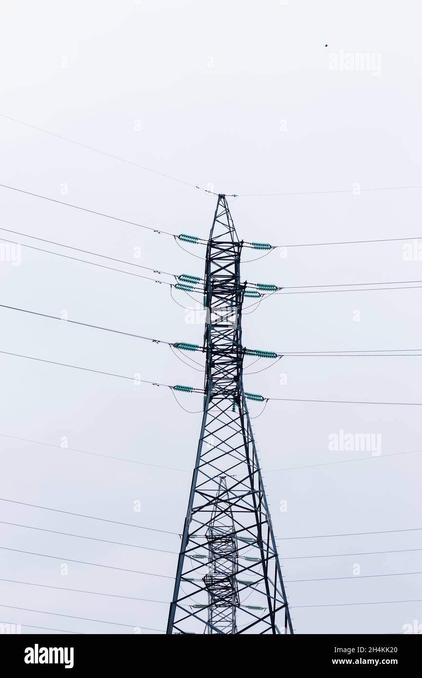 Power lines on the background of the cloudy sky Stock Photo - Alamy