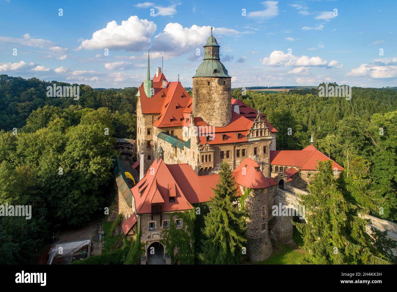 Czocha (Tzchocha) medieval castle in Lower Silesia in Poland. Built in 13th century (the main keep) with many later additions. Aerial view in summer i Stock Photo