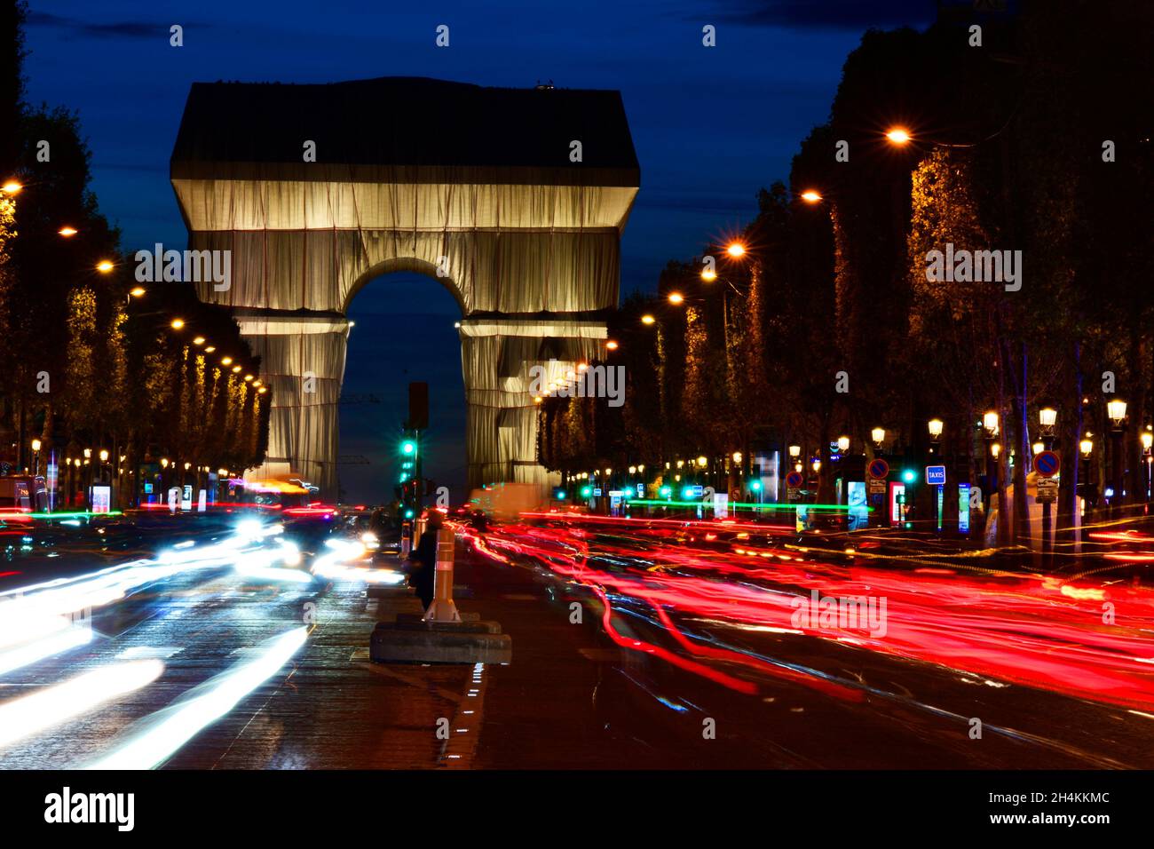 View of the wrapped triumphal arch by Christo by night from avenue des Champs Elysees, Paris, France. Stock Photo