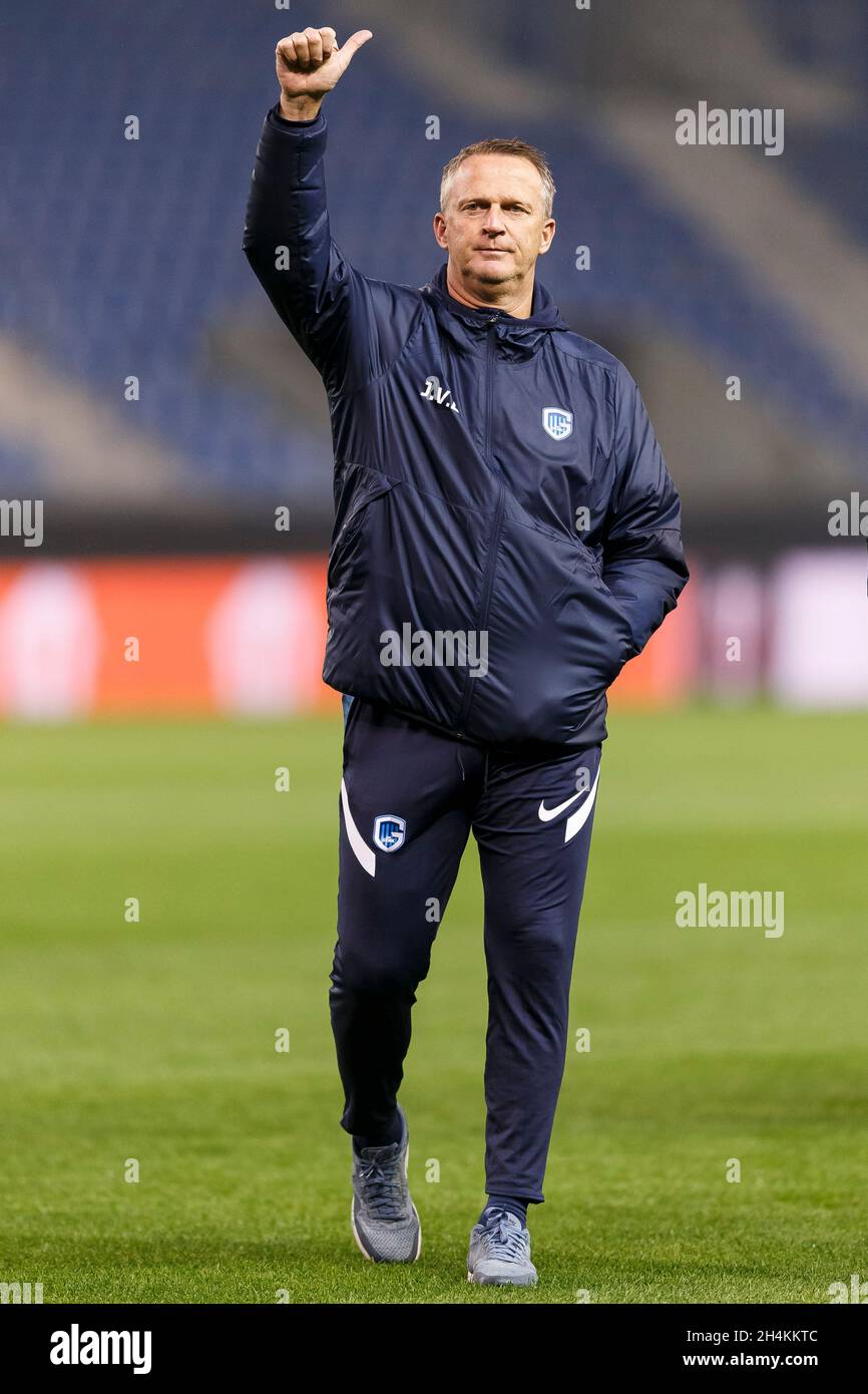 Genk, Belgium. 03rd Nov, 2021. KRC Genk Manager John van den Brom waves to the media during the stadium walkaround before their UEFA Europa League Group H match against West Ham United at Cegeka Arena on November 3rd 2021 in Genk, Belgium. (Photo by Daniel Chesterton/phcimages.com) Credit: PHC Images/Alamy Live News Stock Photo