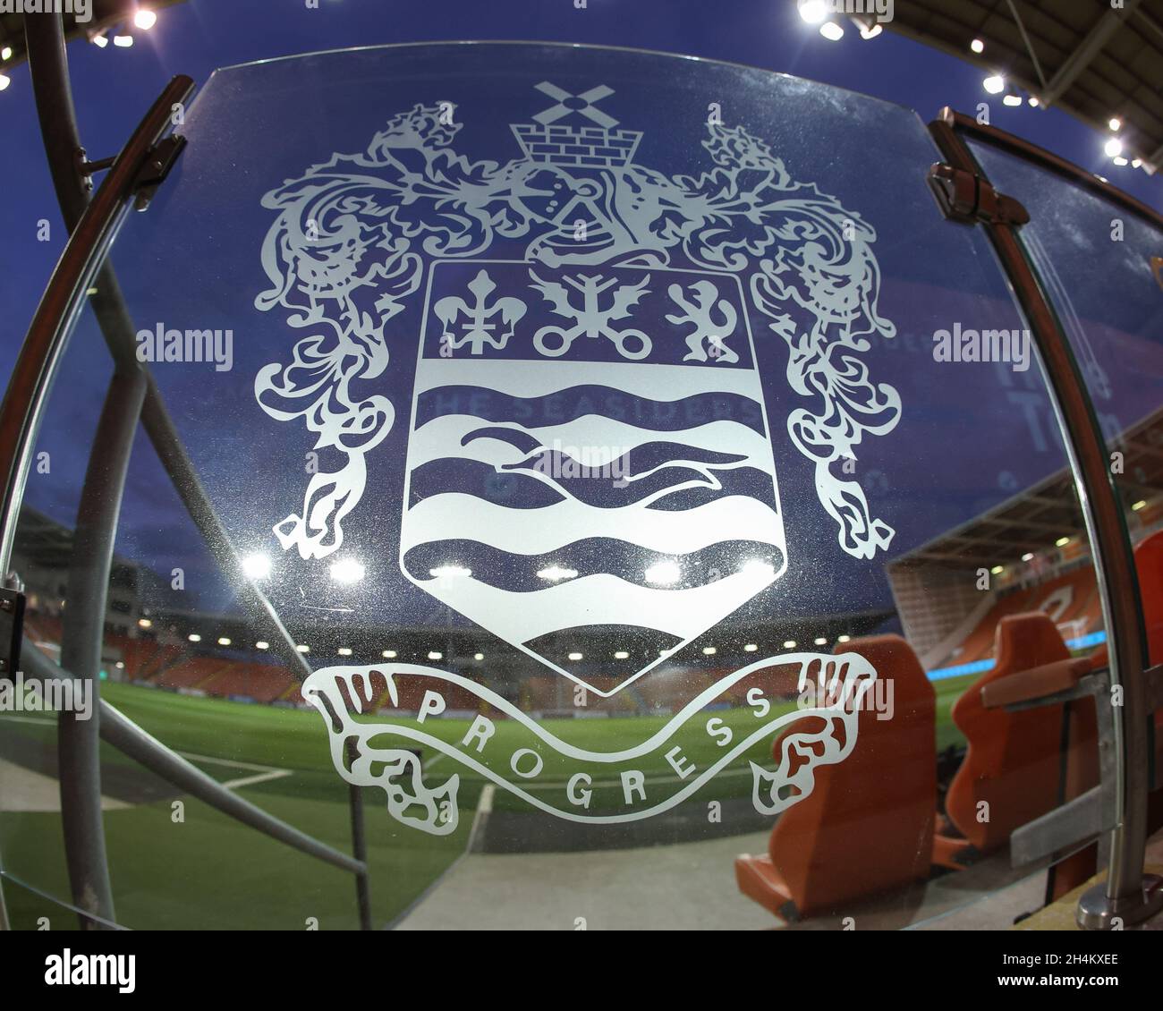 The glass door on Blackpool’s home bench with the motto “Progress