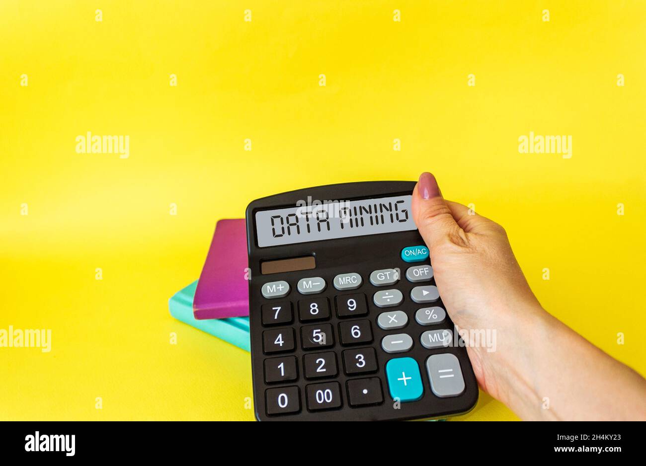 Data Mining is a text label on the display of a successful business research calculator. Stock Photo