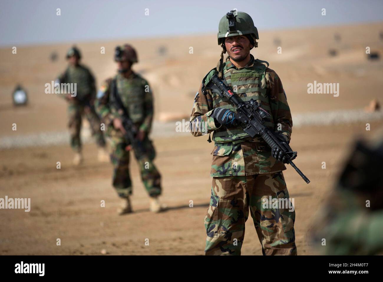 HELMAND PROVINCE, AFGHANISTAN - 02 February 2013 - Afghan Commandos from 3rd Company, 7th Special Operations Kandak participate in react to fire drill Stock Photo