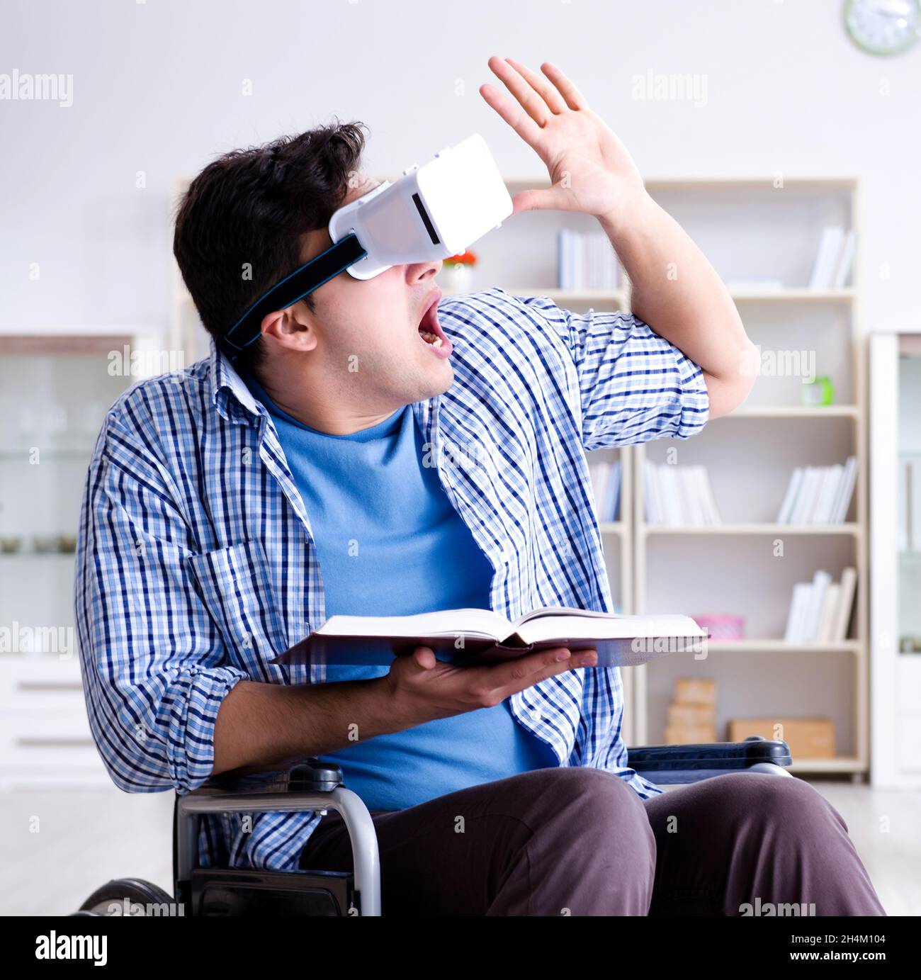 The disabled student studying with virtual reality glasses Stock Photo