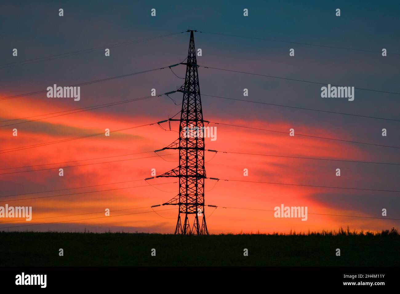 Electricity pylon during sunset hi-res stock photography and images - Alamy