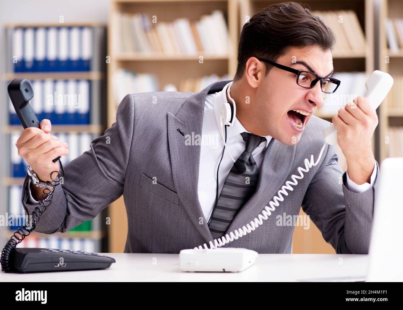 Angry helpdesk operator yelling hi-res stock photography and images - Alamy